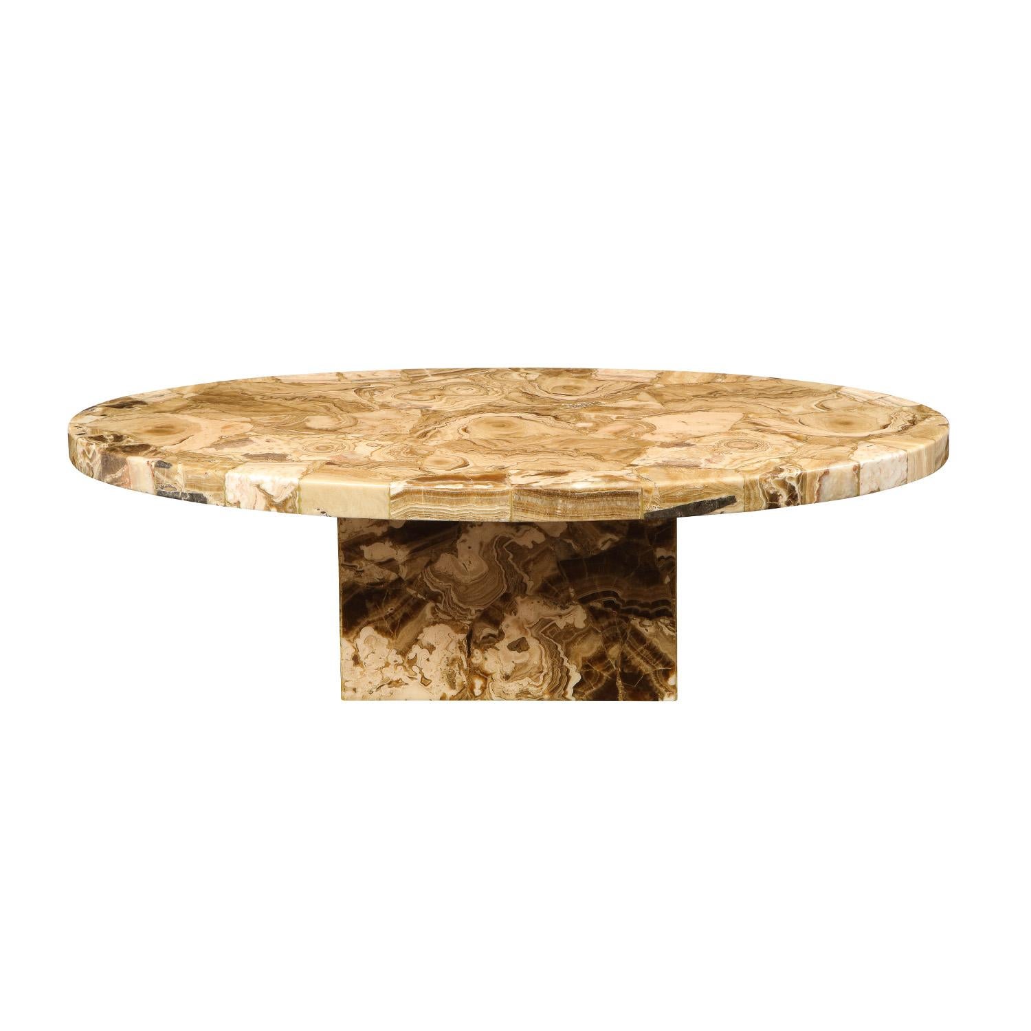 Artisan crafted surfboard shaped coffee table in polished tessellated brown onyx, custom design, American 1970's. The onyx is continuous from the sides to the top. This design is very luxurious and chic.