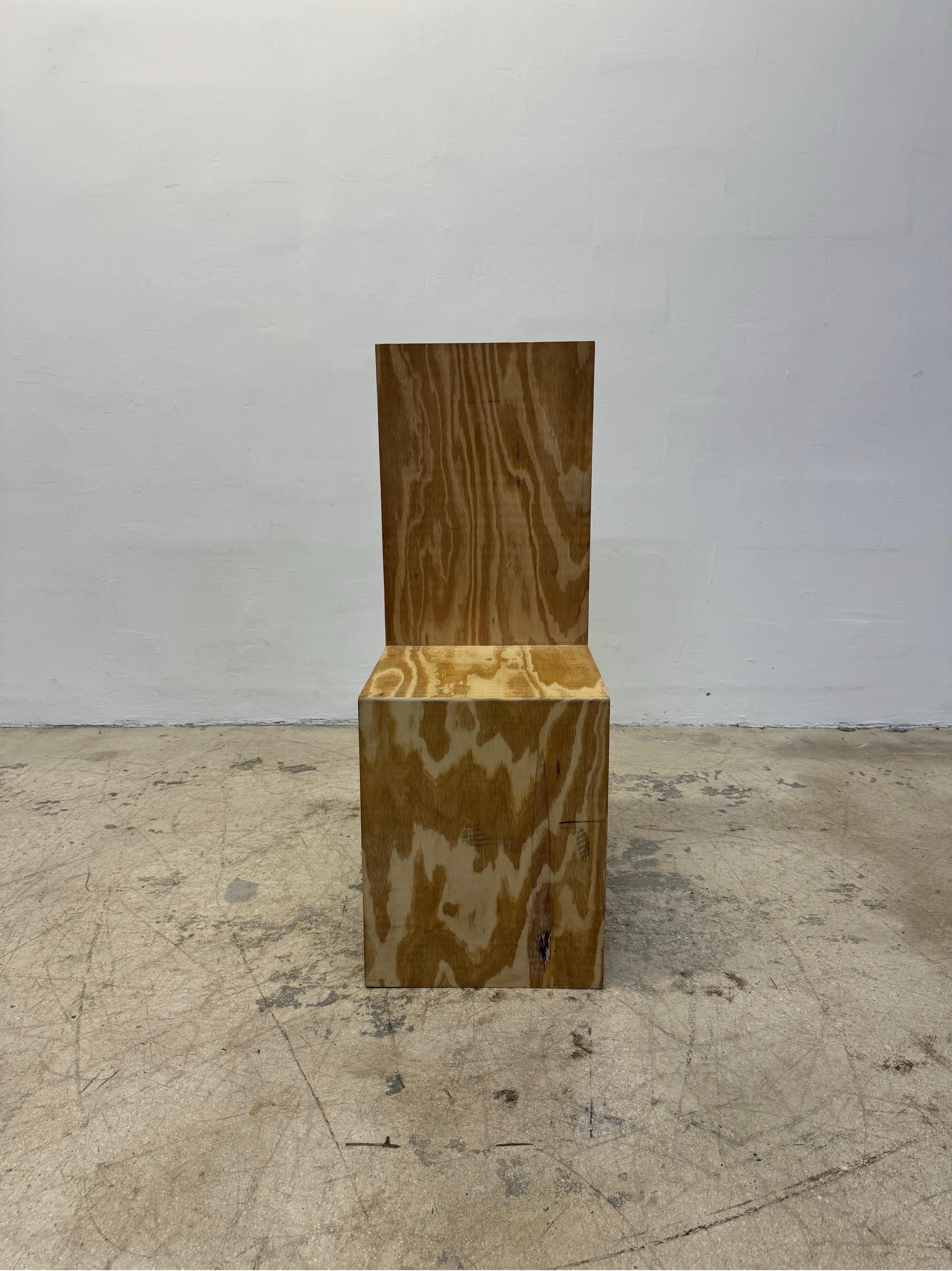 Side or hall chair crafted using thick plywood sheets in the style of Donald Judd.