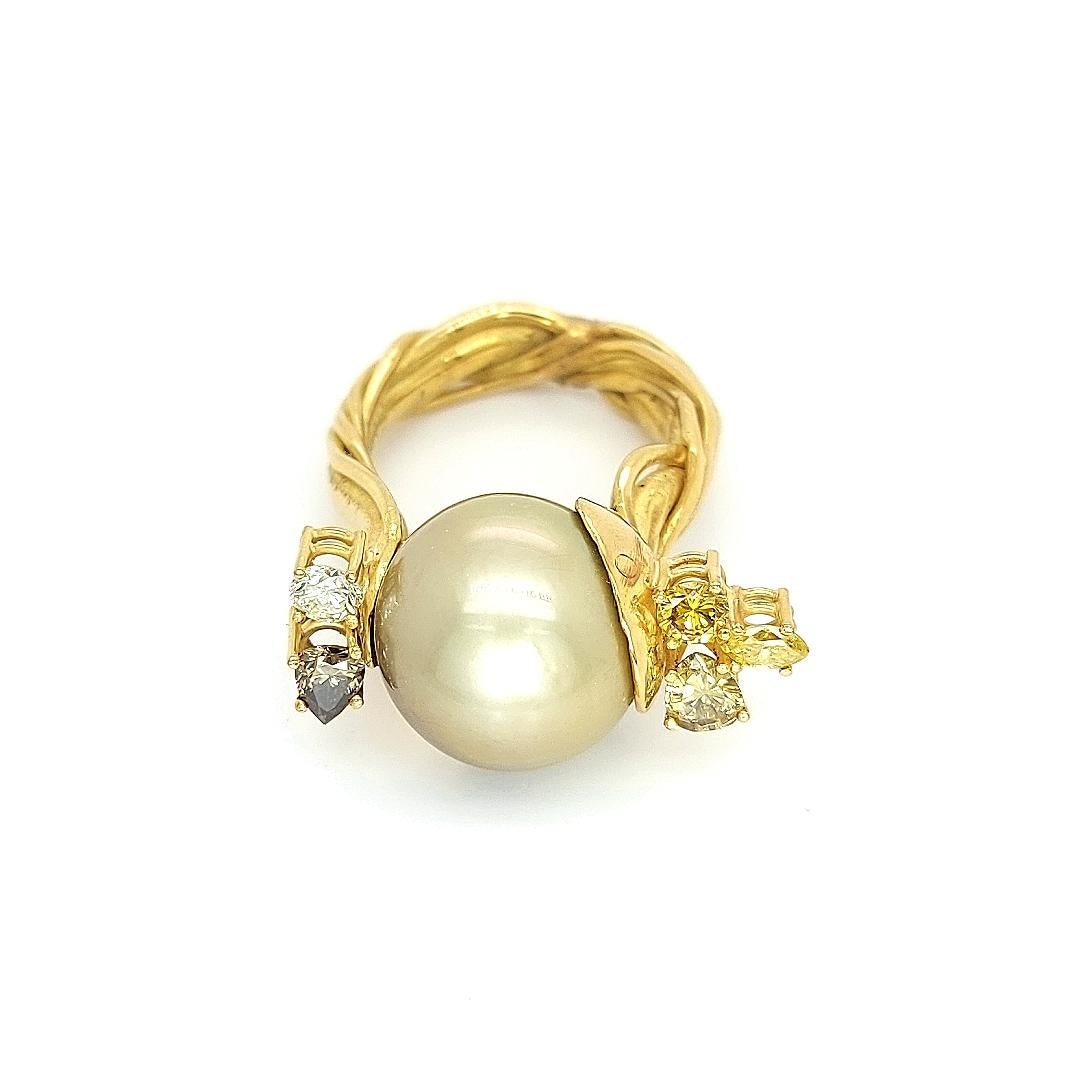 De Saedeleer 18 Kt Yellow Gold Tahiti Pearl & Diamonds Ring

One of a kind Jean Pierre De Saedeleer hand crafted ring.

Only one piece made which makes it so unique  !

Diamond: Fancy & white diamonds ,together ca. 1.22 Cts

Pearl: Tahiti 14.50
