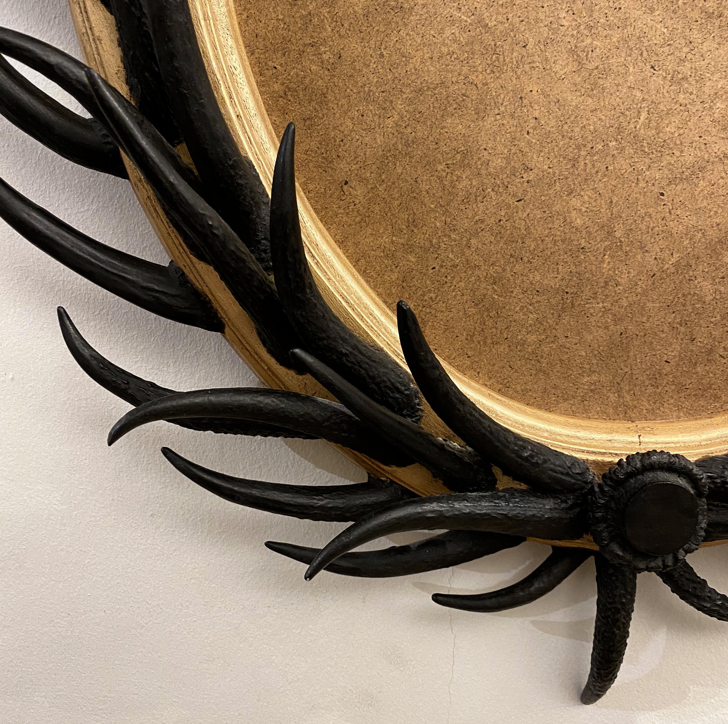 Artisan Designed Dark Antler Oval Mirror with a Crown Motif 7