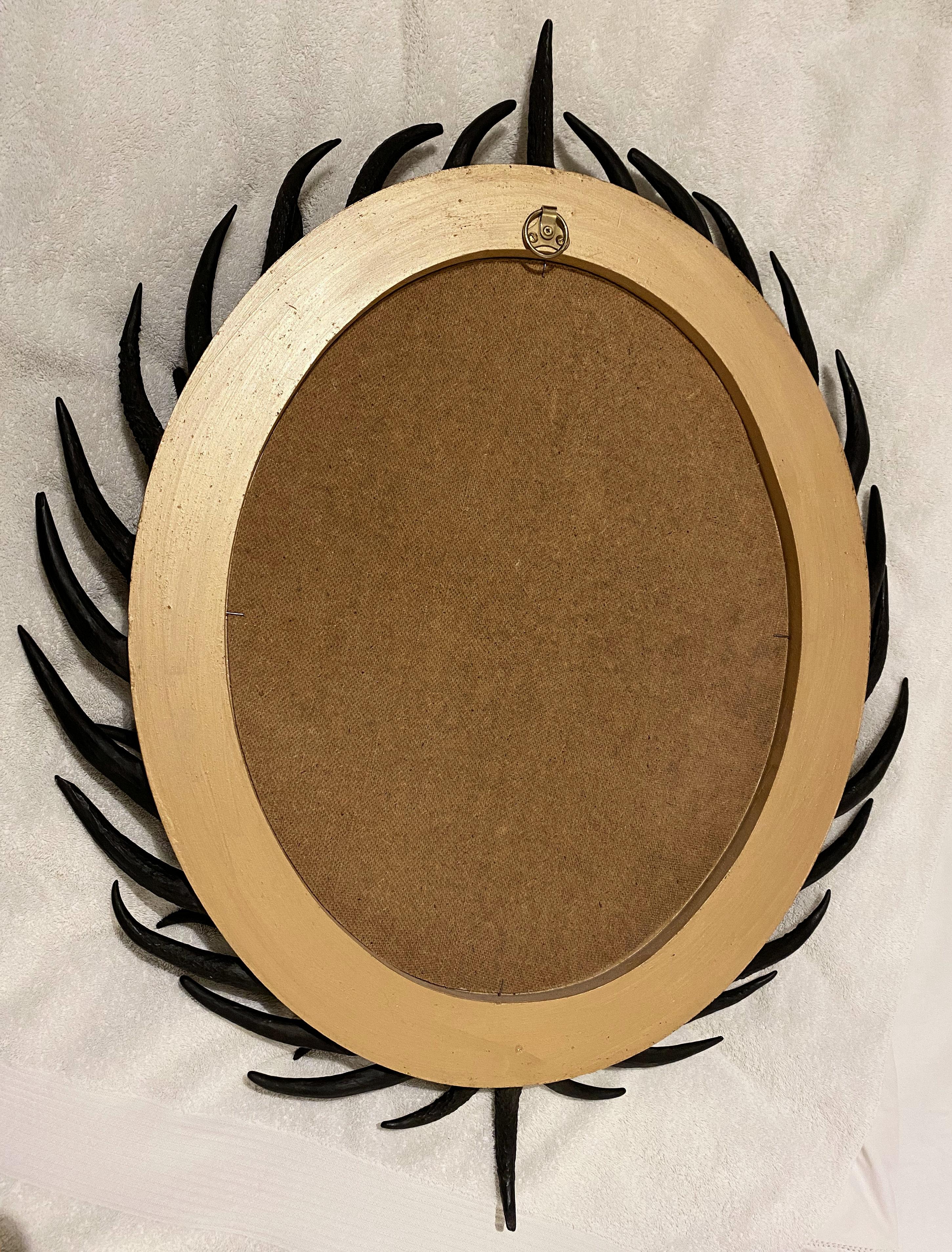 Artisan Designed Dark Antler Oval Mirror with a Crown Motif 9