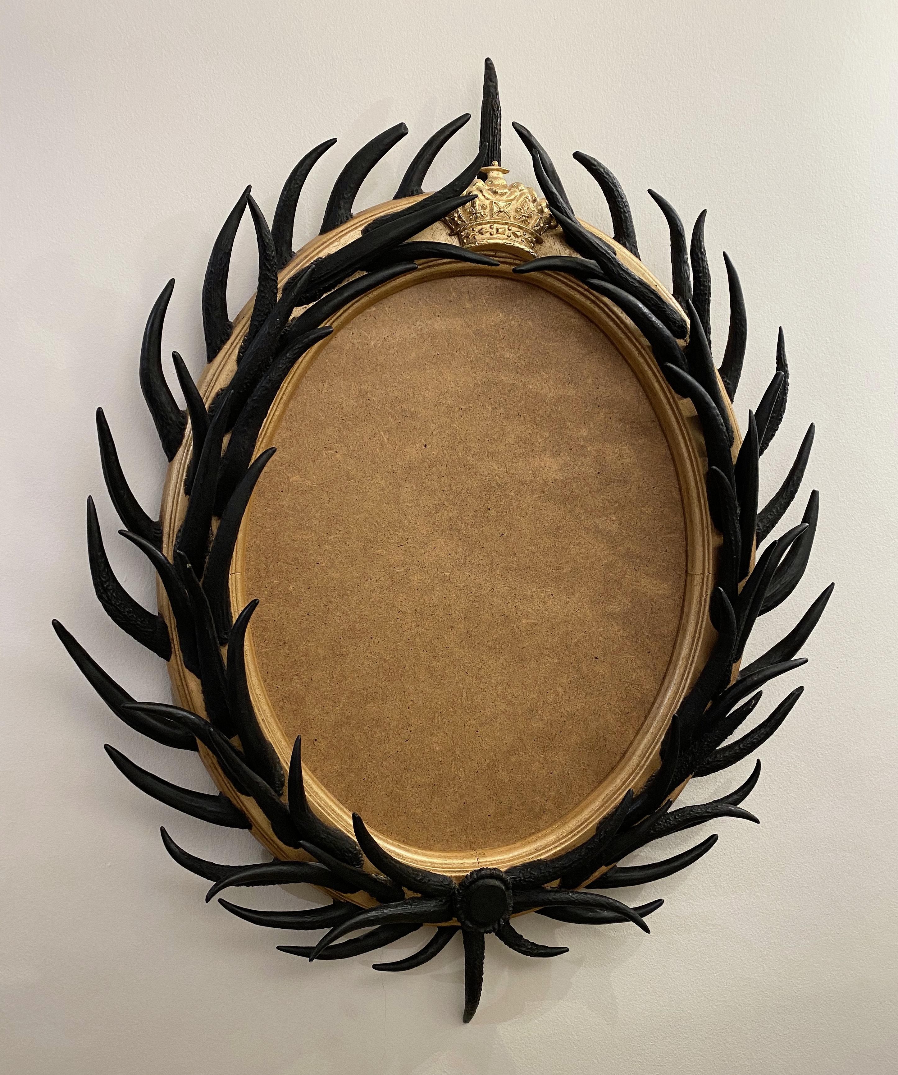 Artisan Designed Dark Antler Oval Mirror with a Crown Motif 10