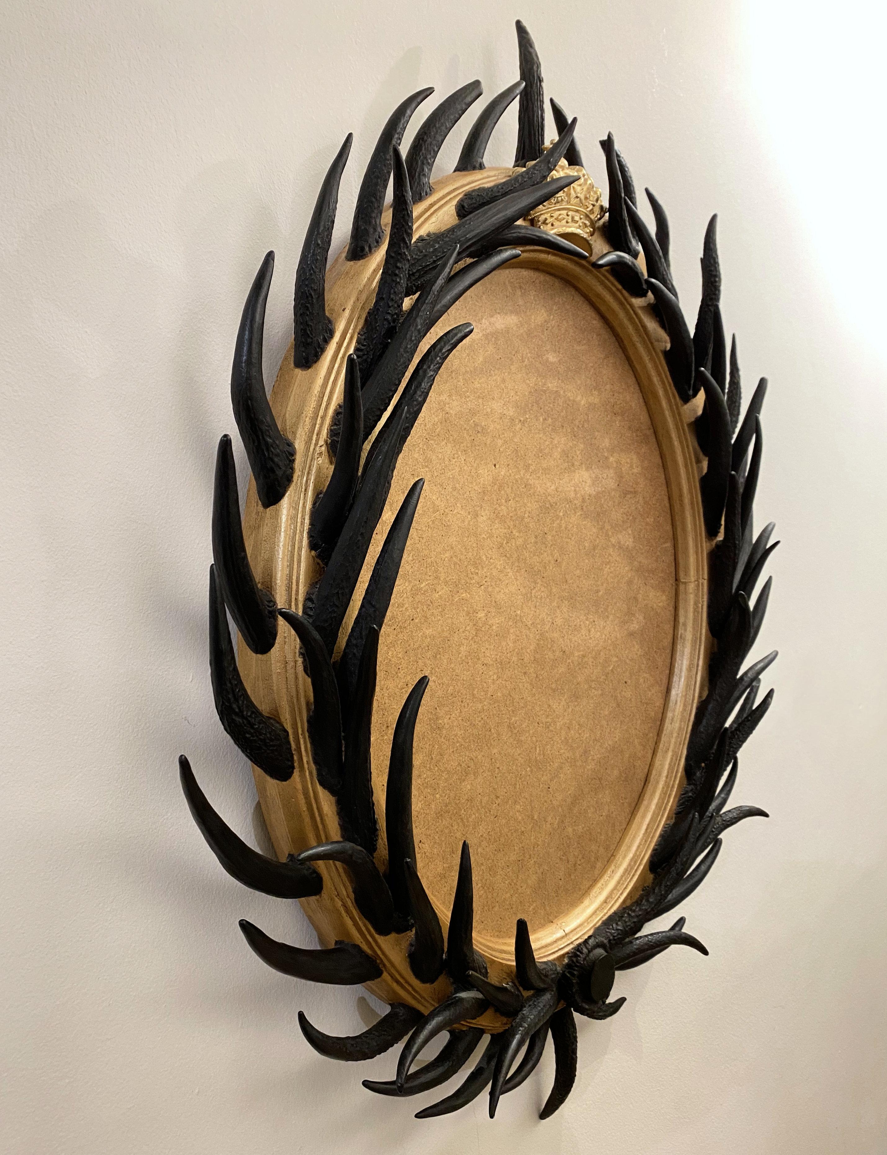 British Artisan Designed Dark Antler Oval Mirror with a Crown Motif