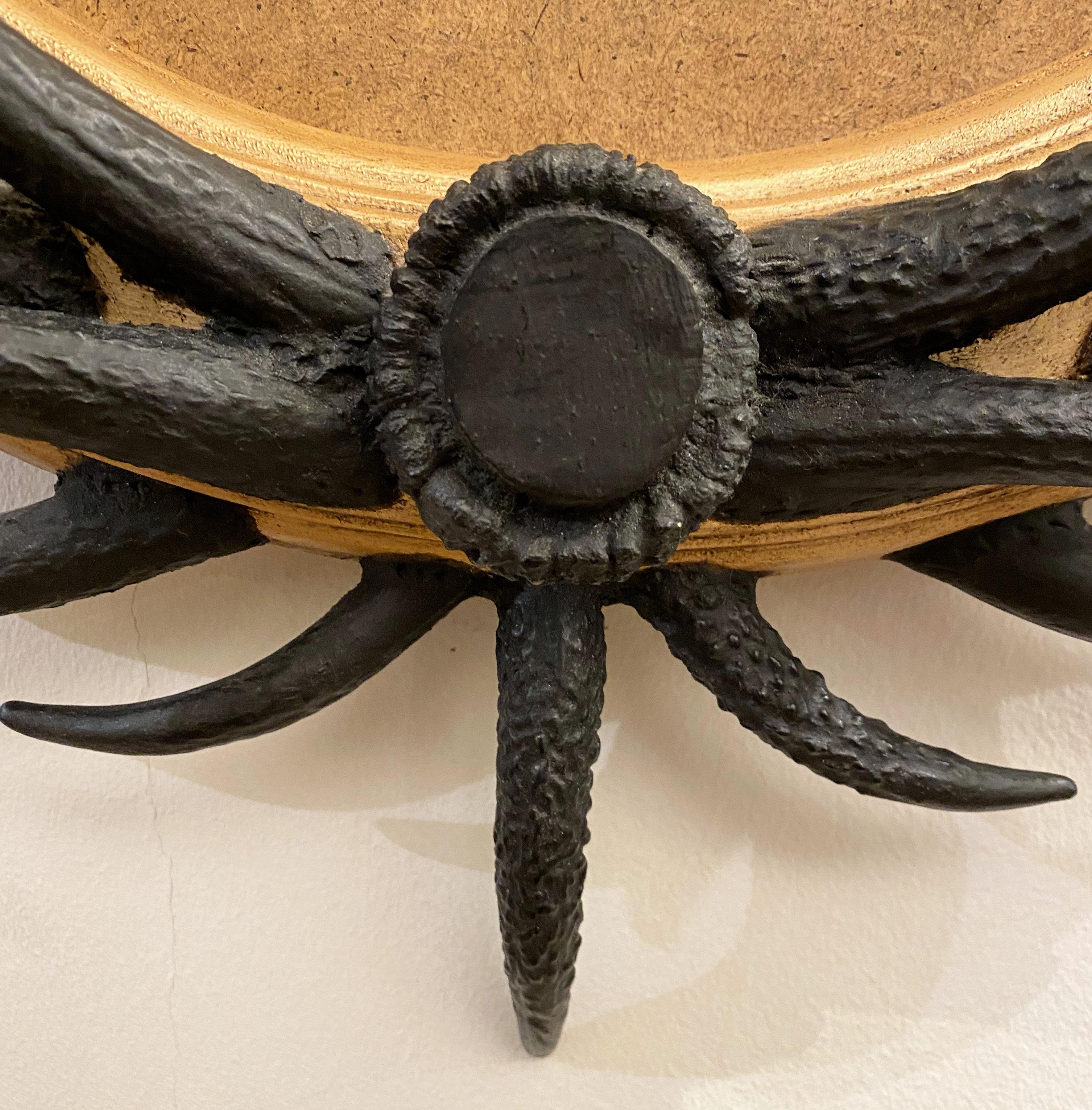 Artisan Designed Dark Antler Oval Mirror with a Crown Motif 1