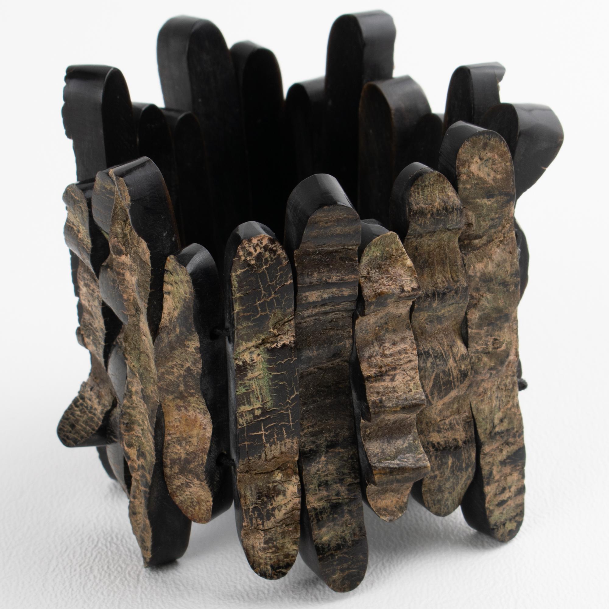 Modernist Driftwood Stretch Bracelet ��– Artisan Studio Design
This striking modernist bracelet is a bold expression of organic design and brutalist craftsmanship, created by an artisan studio. The rare piece features a chunky, hand-crafted stretch
