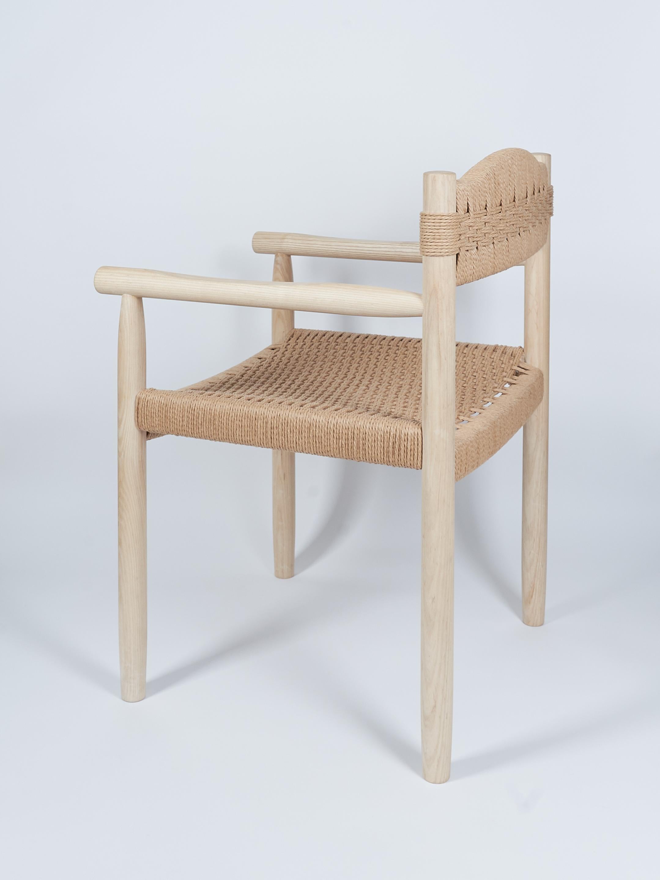 Artisan Dining room chair in ash - Woven Danish cord seat and back. In New Condition For Sale In Millburn, NJ