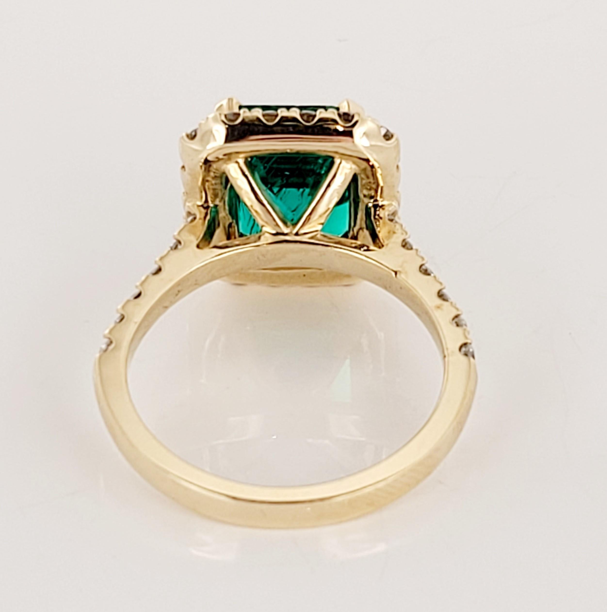 Artisan Emerald Cut Emerald Ring with Diamonds In New Condition For Sale In New York, NY