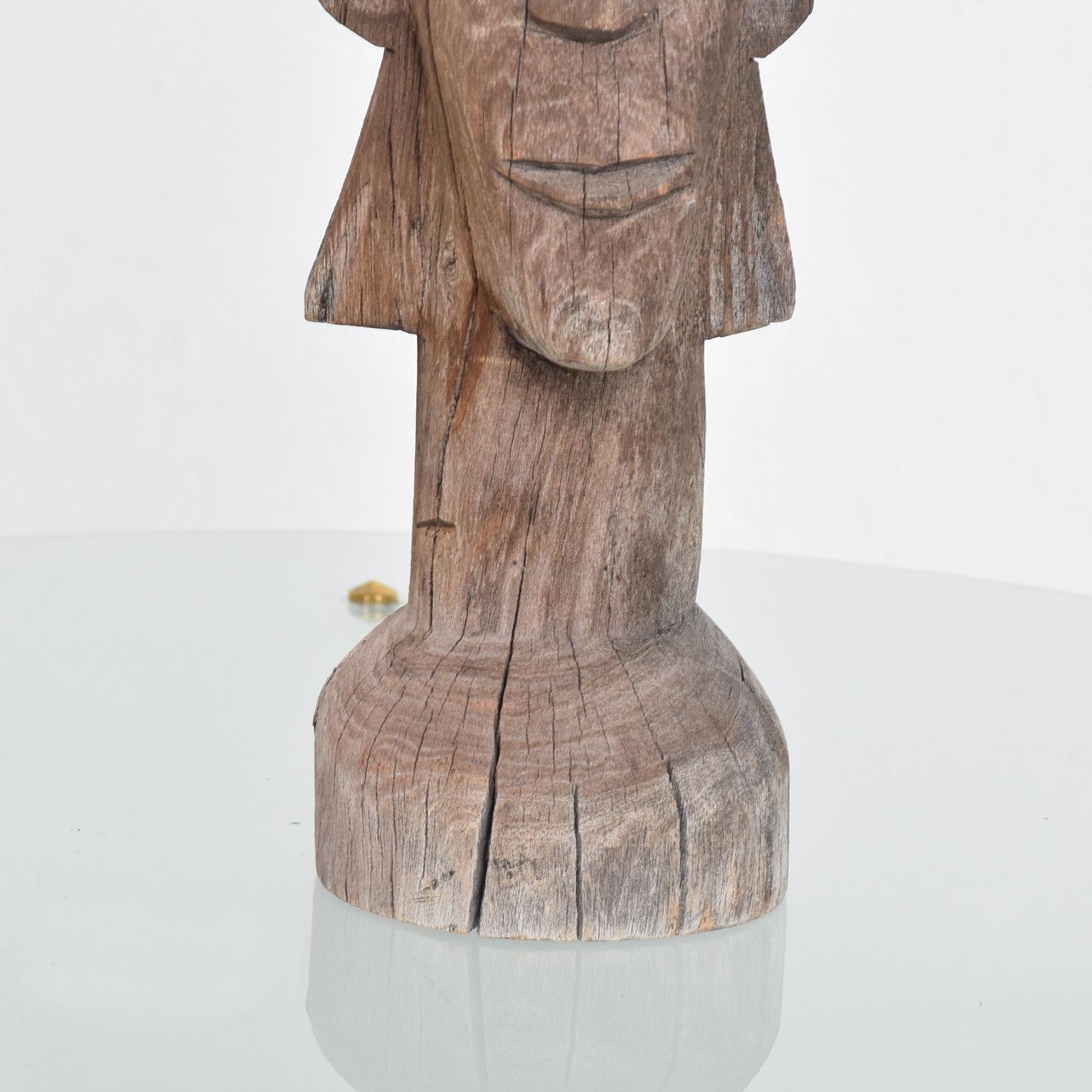 For your consideration: Artisan hand carved wood TOTEM sculpture vintage indigenous primitive artwork

Dimensions: 18 1/2