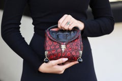 Borsetta artigianale in argento e coccodrillo fatta a mano