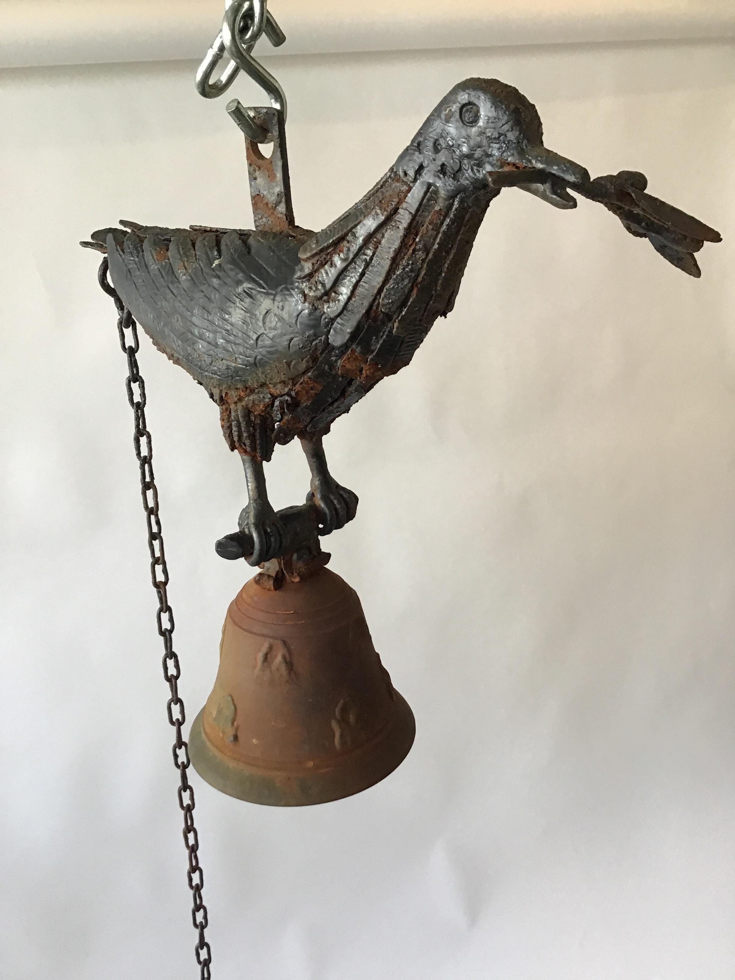 One of a kind, artisan made iron dove with olive branch bell. Pull the chain, and the bell chimes. From an artist’s estate in Westchester, NY.