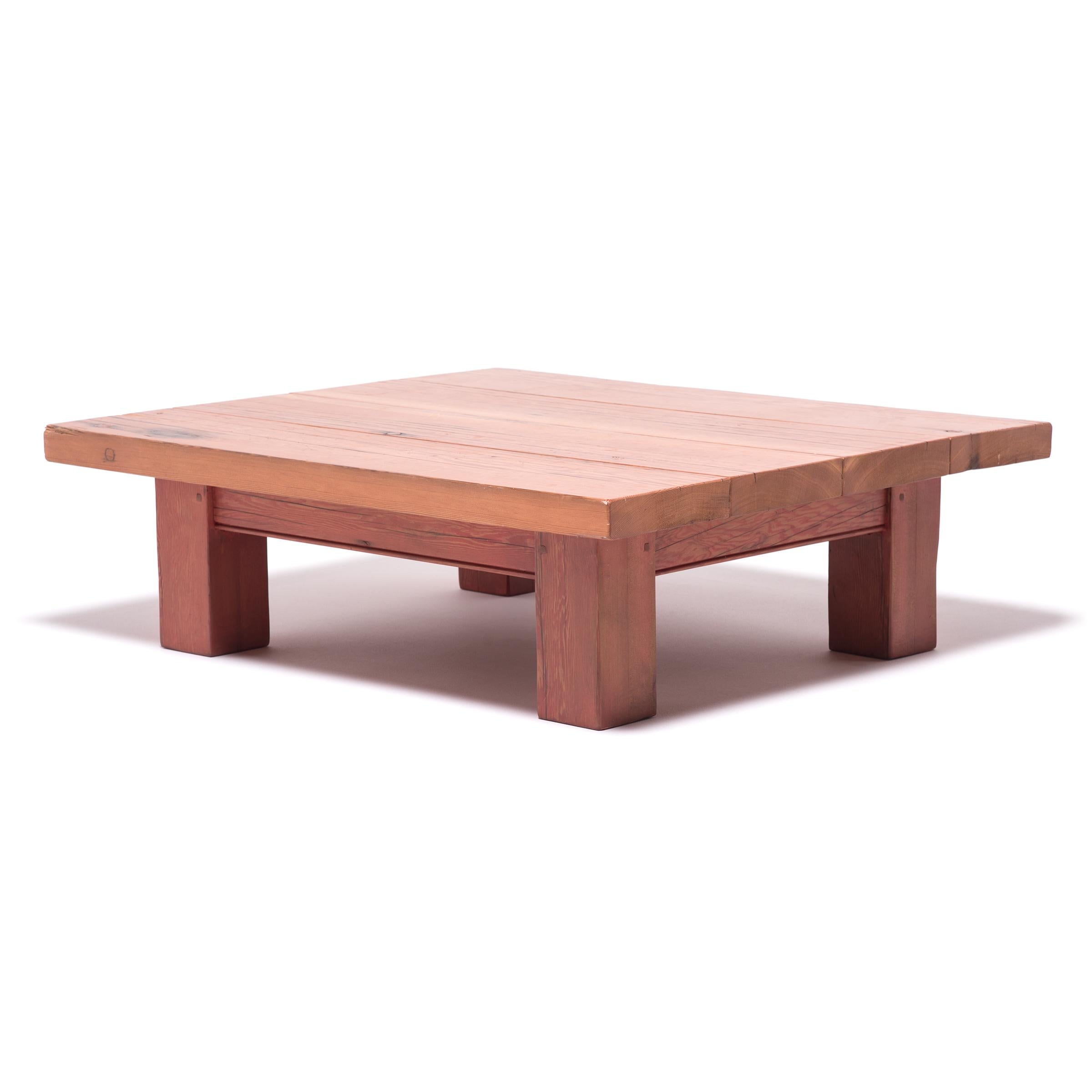 In accordance with traditional Chinese woodworking, this artisan-made table demonstrates the utmost respect for form and function. Straightforward and earnest, this example of re-purposed artistry lets the knots, grain, and imperfections of