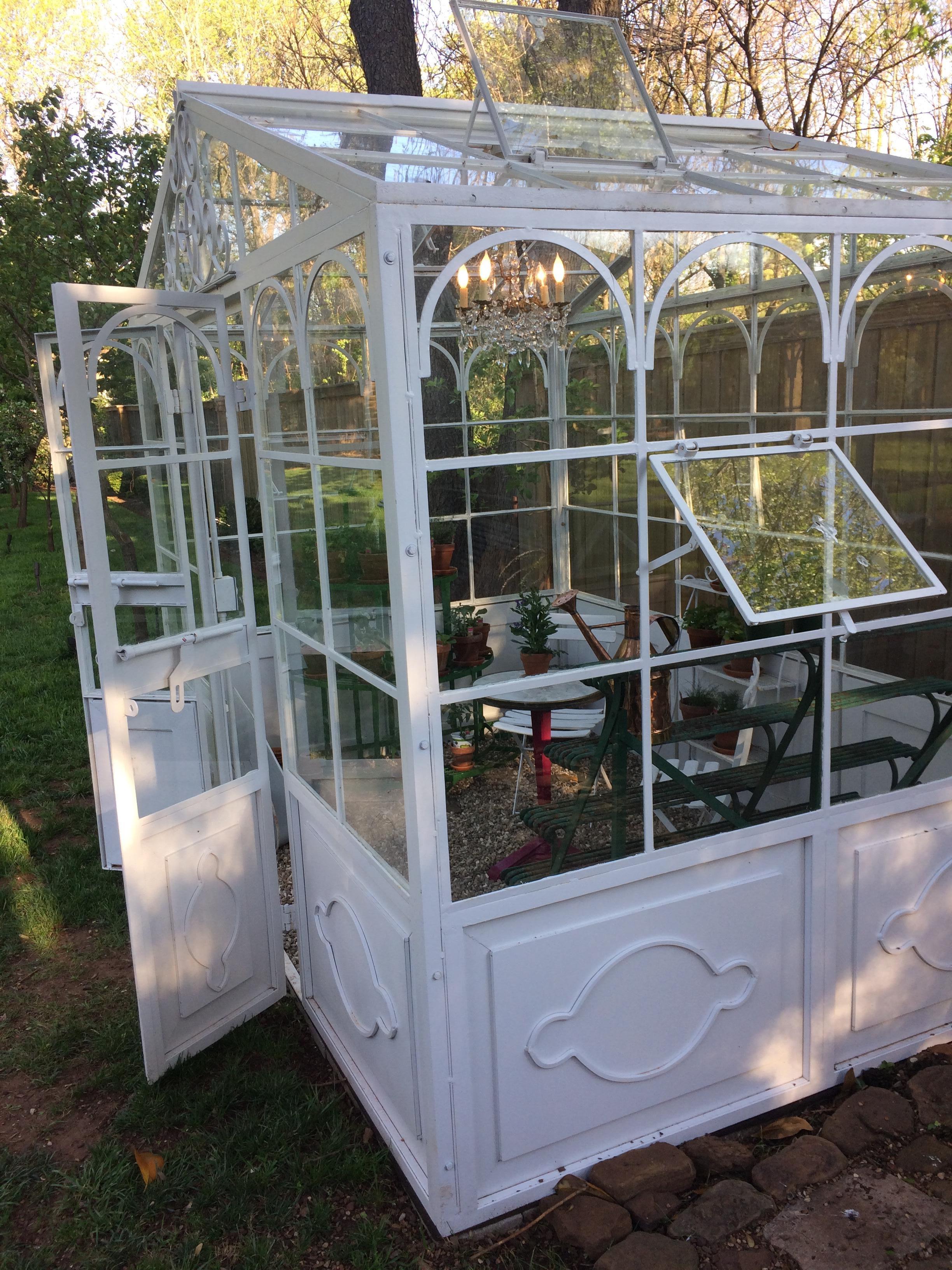 With a footprint of 10 feet wide by 6.5 feet deep, this French artisan-made greenhouse is constructed of welded steel. Each wall and roof section is separate and sections are bolted together on site. The roof line has a maximum height of 100 inches