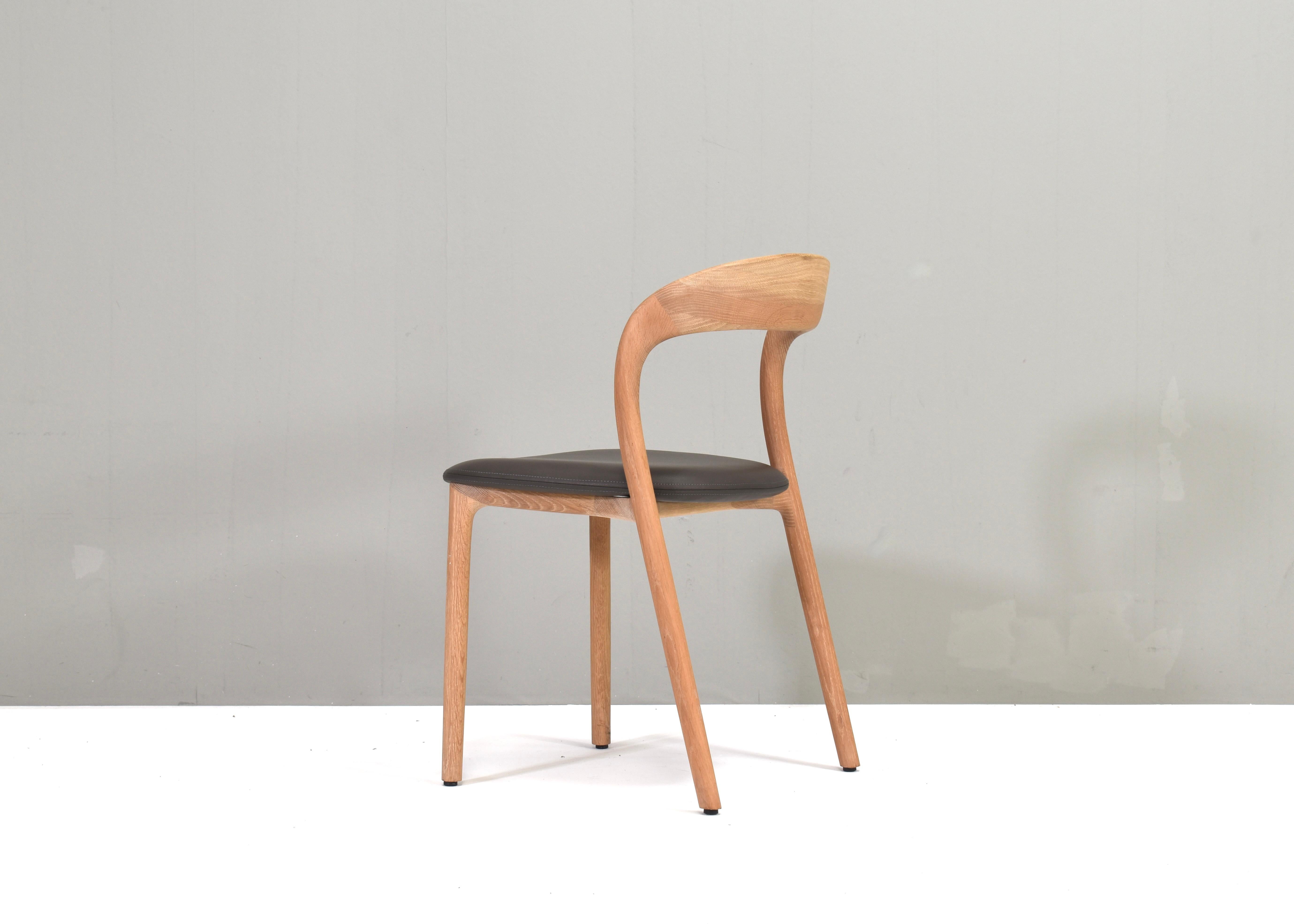 Mid-Century Modern Artisan Neva light chair in oak and leather, Bosnia. For Sale