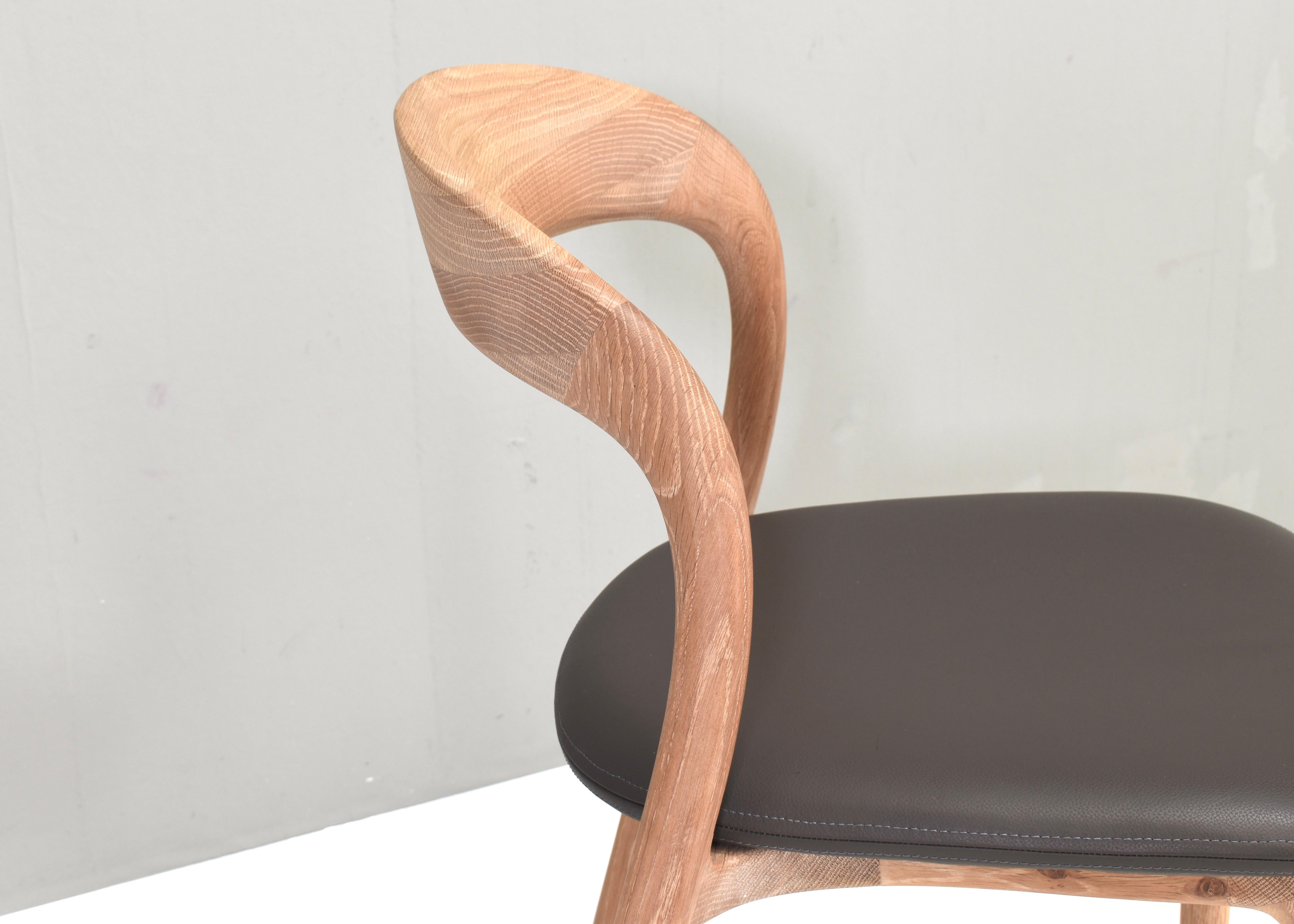 Contemporary Artisan Neva light chair in oak and leather, Bosnia. For Sale