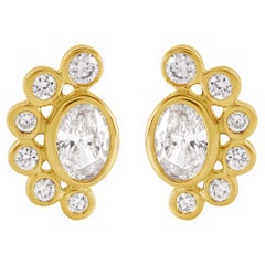 Boucles d'oreilles artisanales contemporaines en or jaune 14K avec diamant de taille ovale