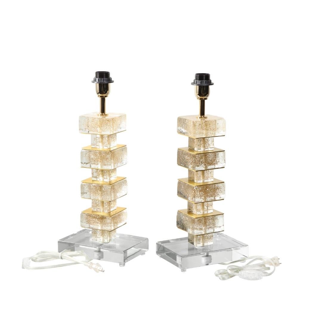 Handcrafted artisan pair of Murano glass table lamps with gold inclusions throughout and brass hardware. Itay 2022. 

Made to order.

Lamp shades are not included. 

Dimensions:
Width: 7 inches
Depth: 8 inches
Height: 20 inches

Condition: New