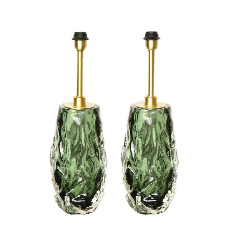 Elegant pair of hand-blown Murano sommerso emerald and clear glass table lamps with brass fittings. Italy 2022.