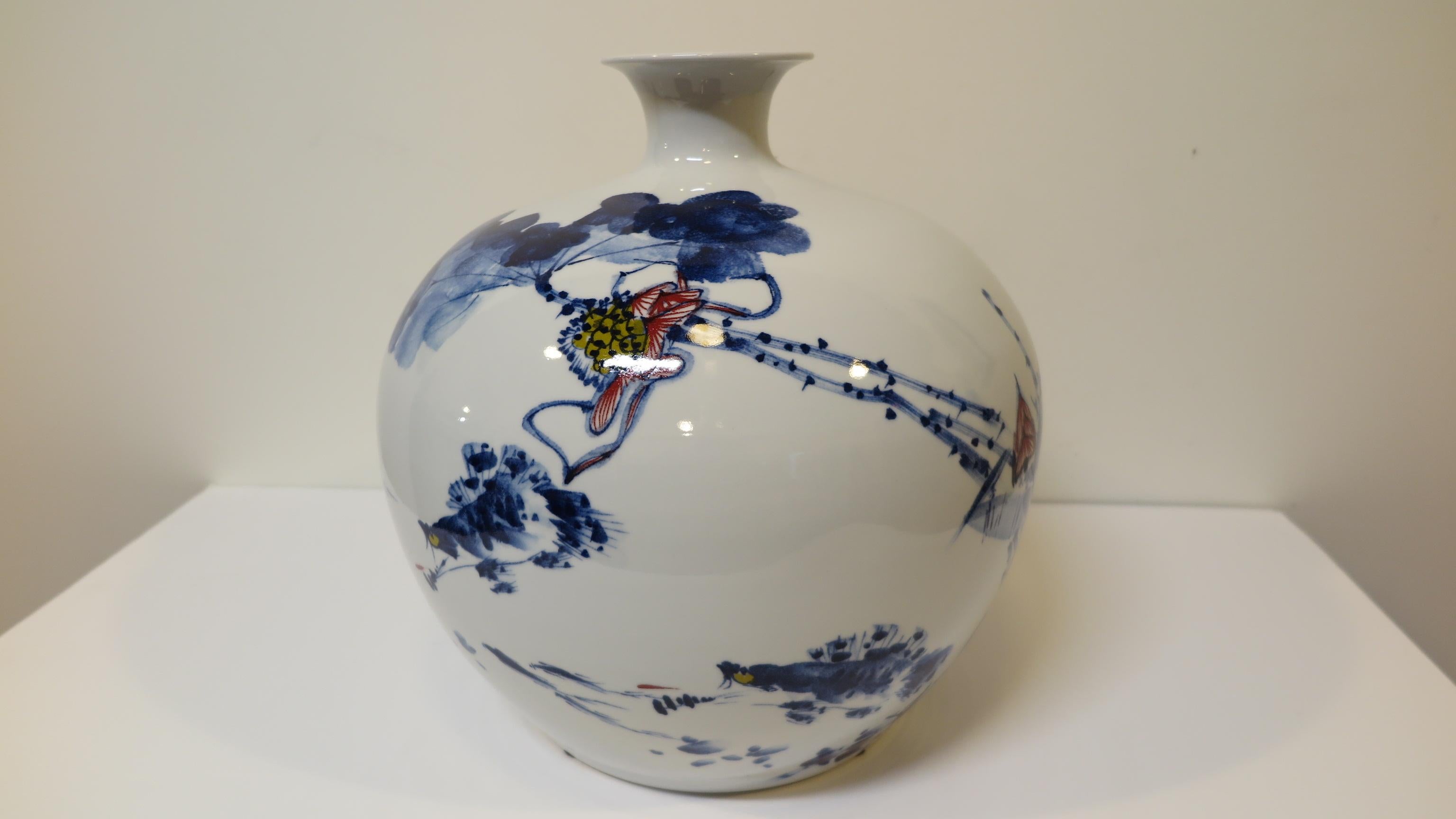 Artisan porcelain Vase Vessel hand formed of quality high fired fine porcelain. Wonderful shape with Indigo painting completely hand crafted. Artist-signed with poem.