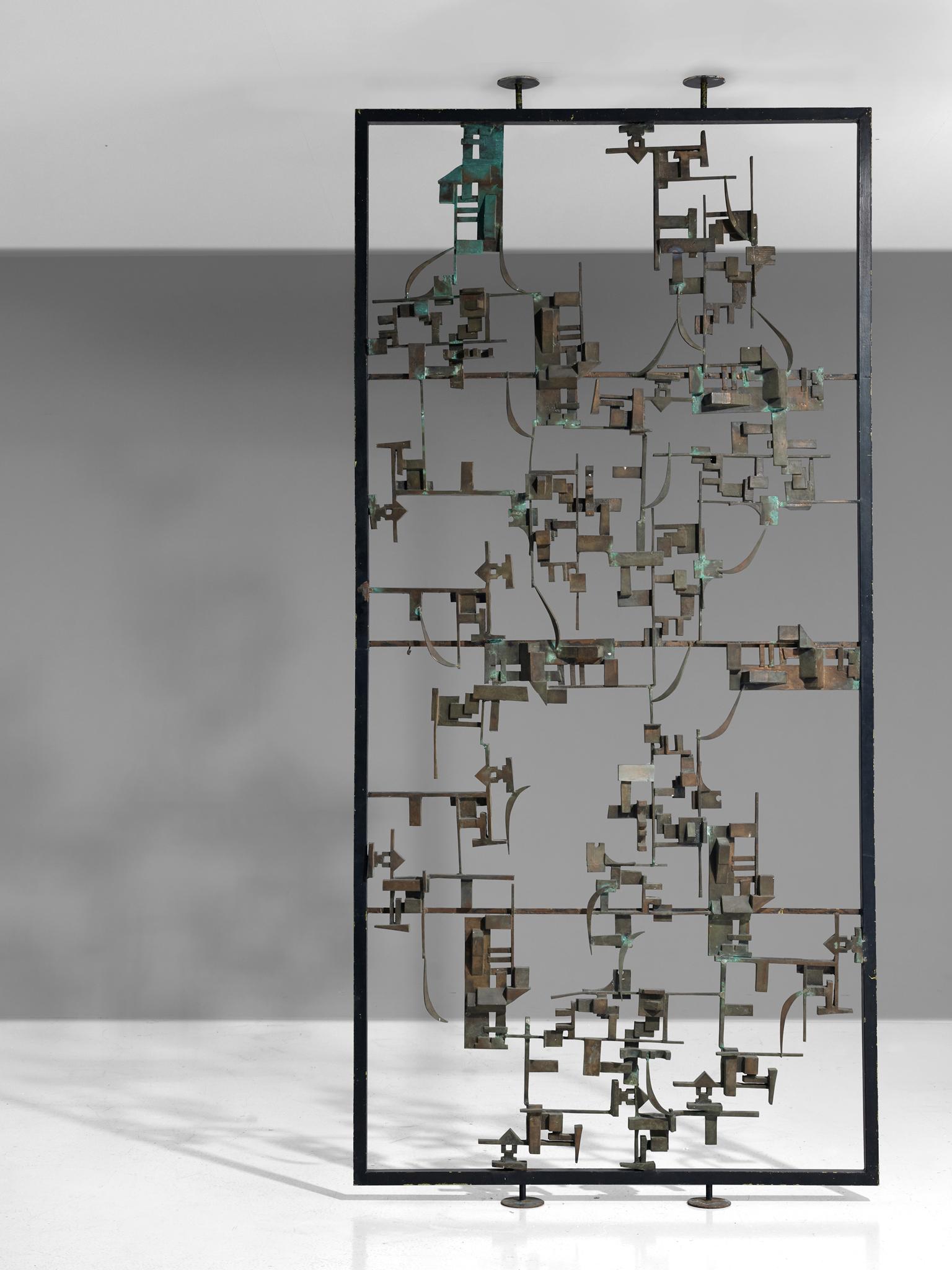 Room divider, bronze and metal, Italy, 1960s

An Italian Postwar room screen that finds itself at the intersection of art and design. This highly sculptural piece consists of an abstract structure in bronze with abstract shapes and contrast between