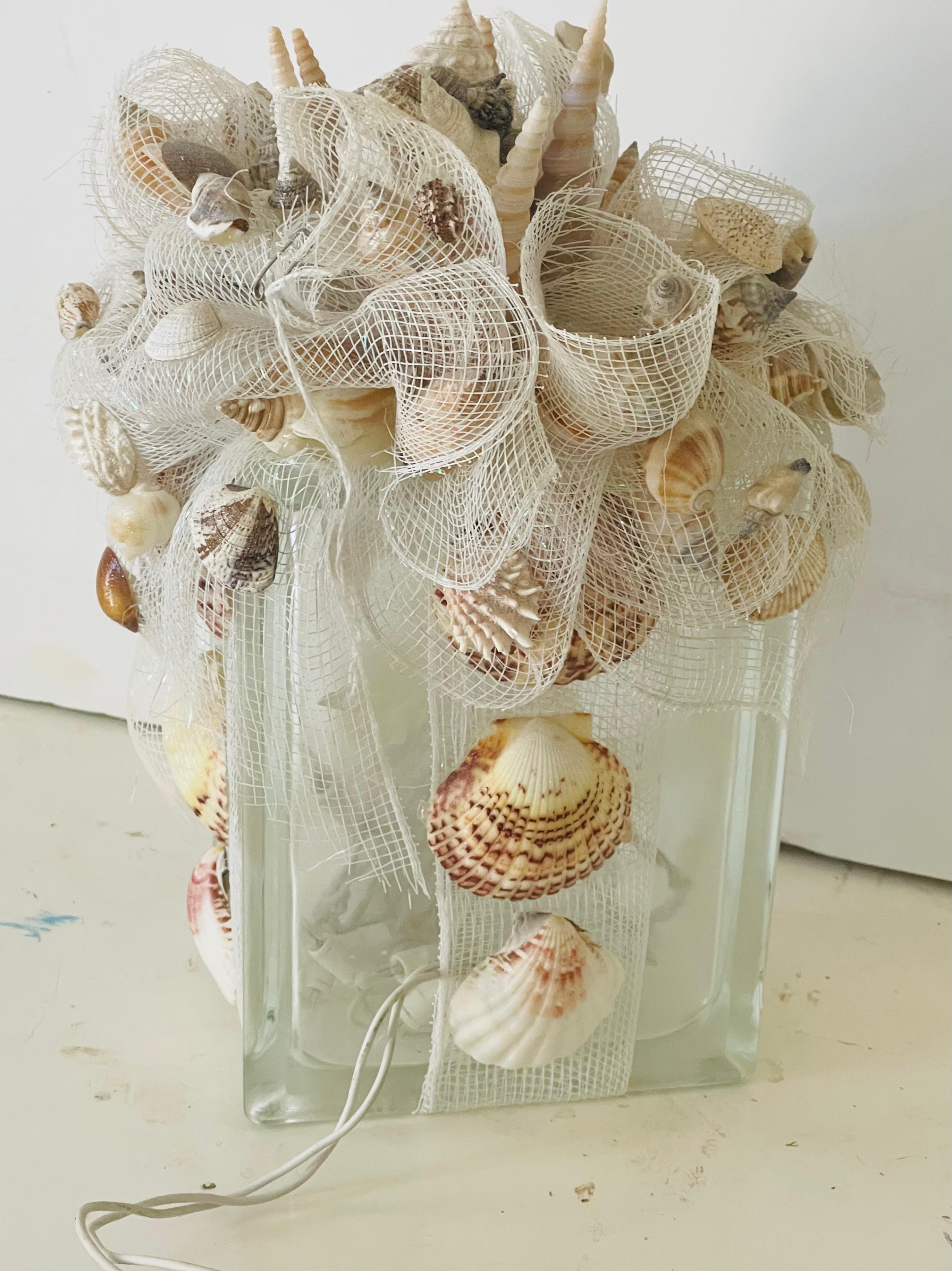 Artisan made sea shell decorated night lamp as great coastal decor accent. Unique one of a kind, gives great soft romantic light.