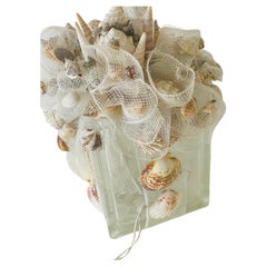 Lámpara de noche artesanal de conchas de mar Costera