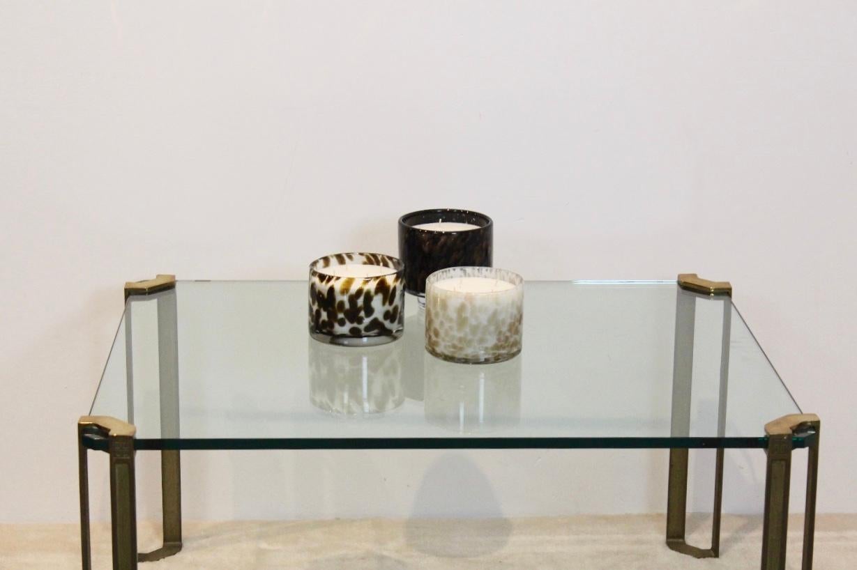 Elegant set of three candleholders in Leopard style designed by the Elements collection and made by Henry Dean in Belgium. The glass of these candleholders is created out of mouthblown and handmade glass. They are made using a wooden mold, which is
