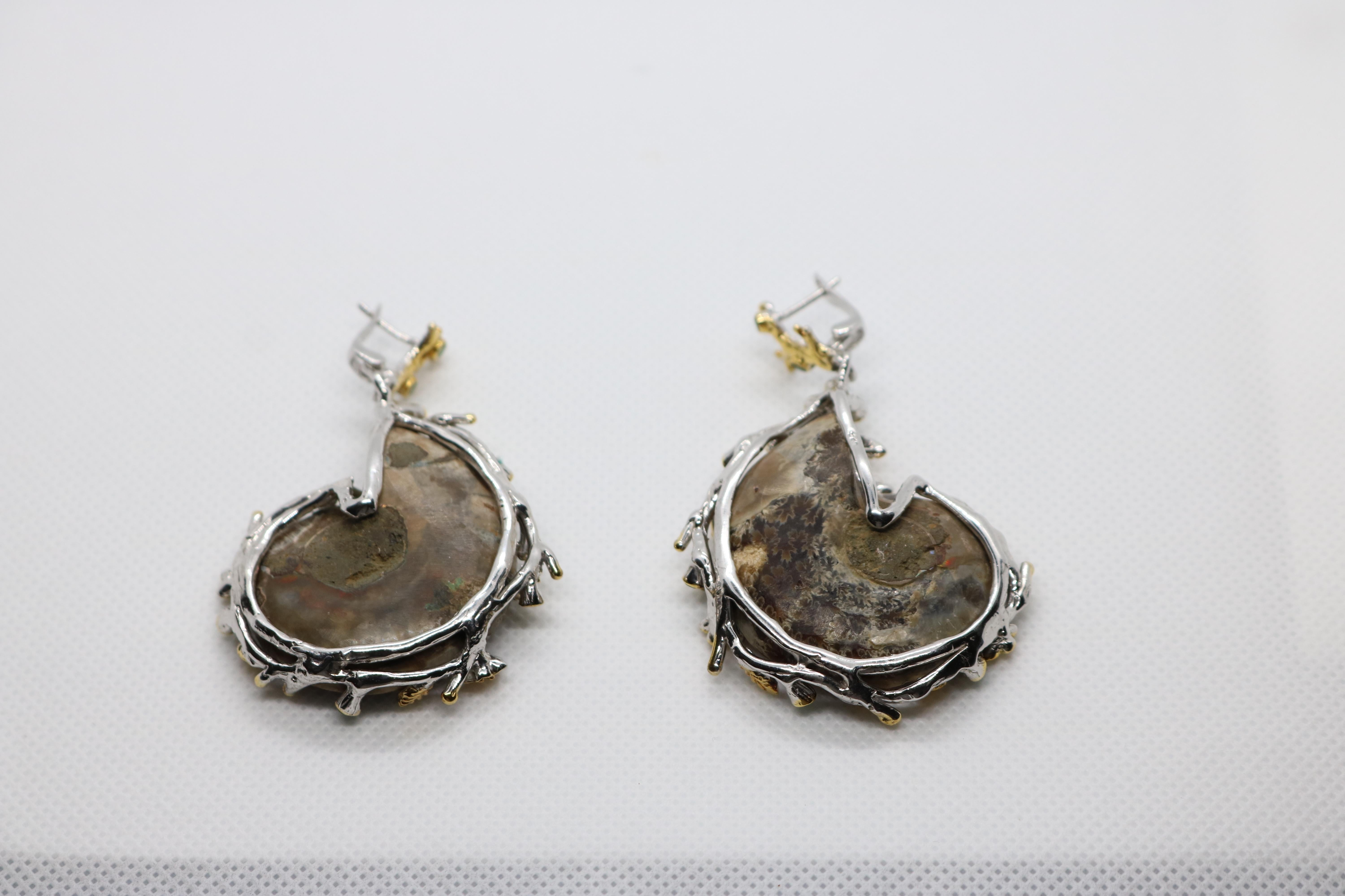 20th Century Artisan Sterling Gold Ammonite Fossil Earrings with Emeralds For Sale