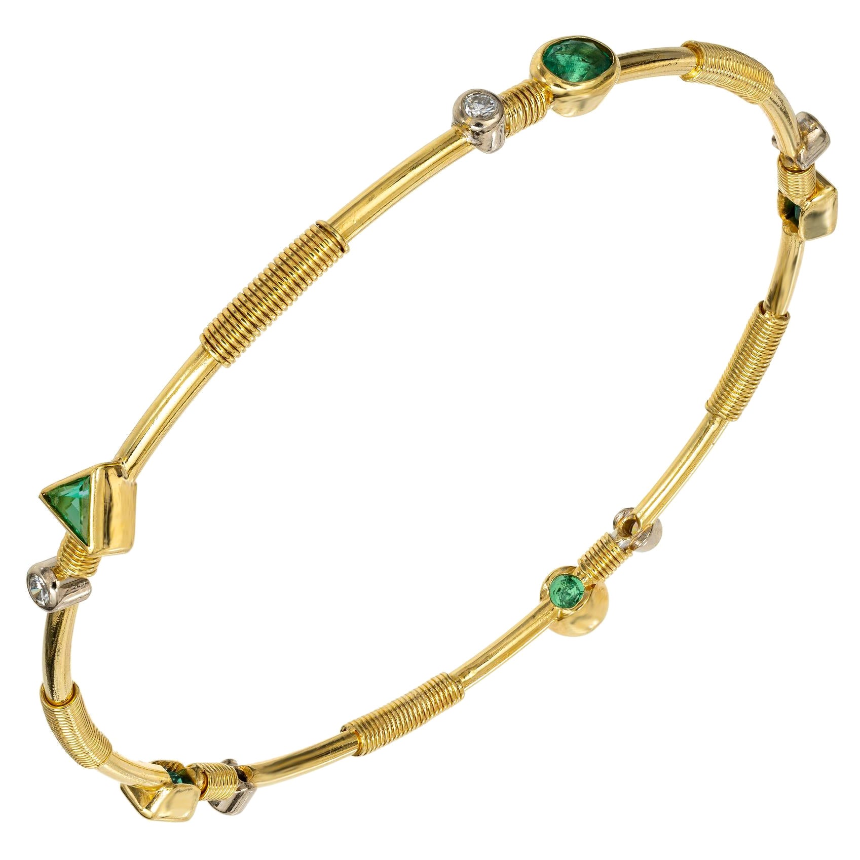 Bracelet jonc en or avec diamants et émeraudes