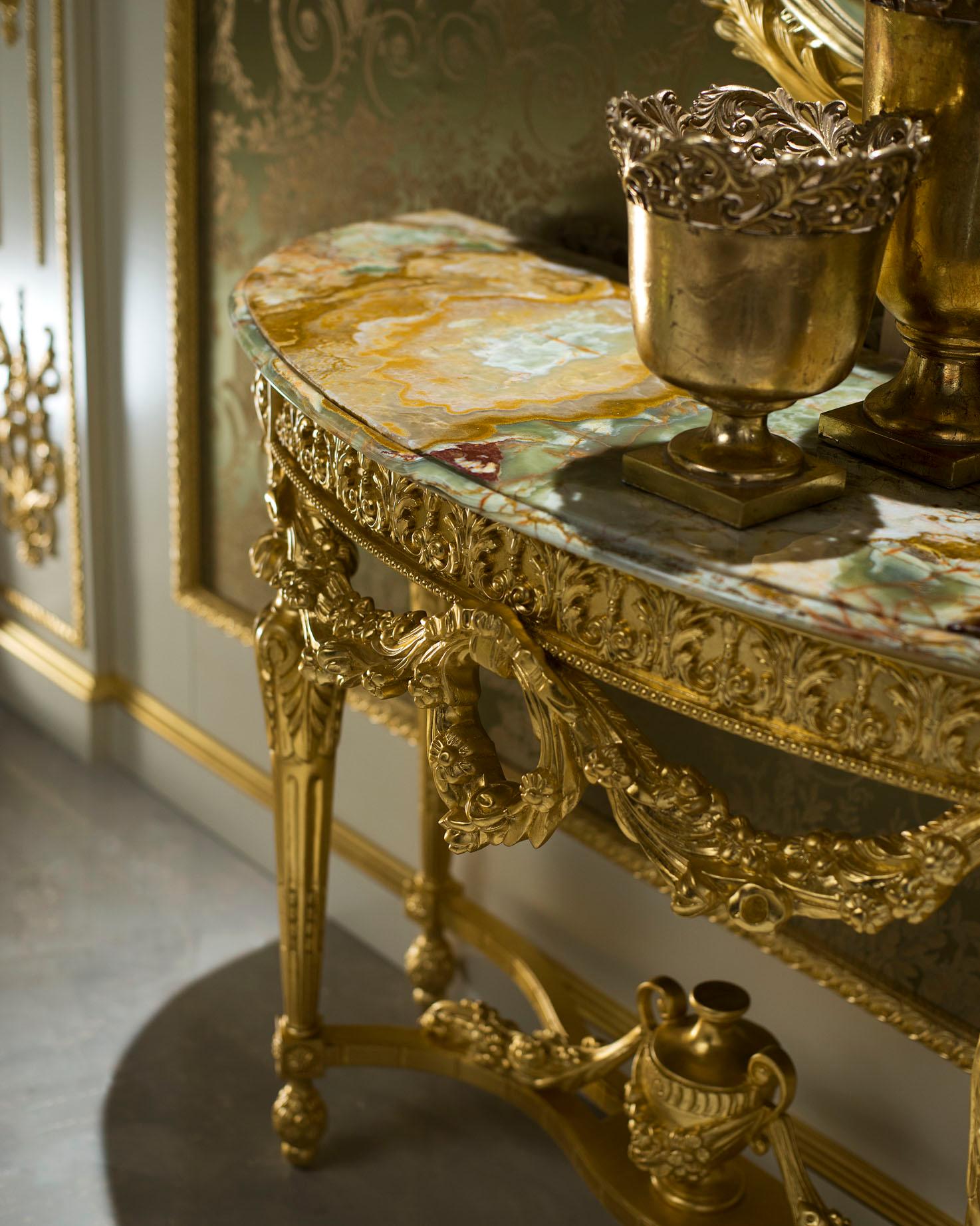 Appliqué Artisanal Empire Console in Gold Leaf with Marble Top and Handmade Carvings For Sale