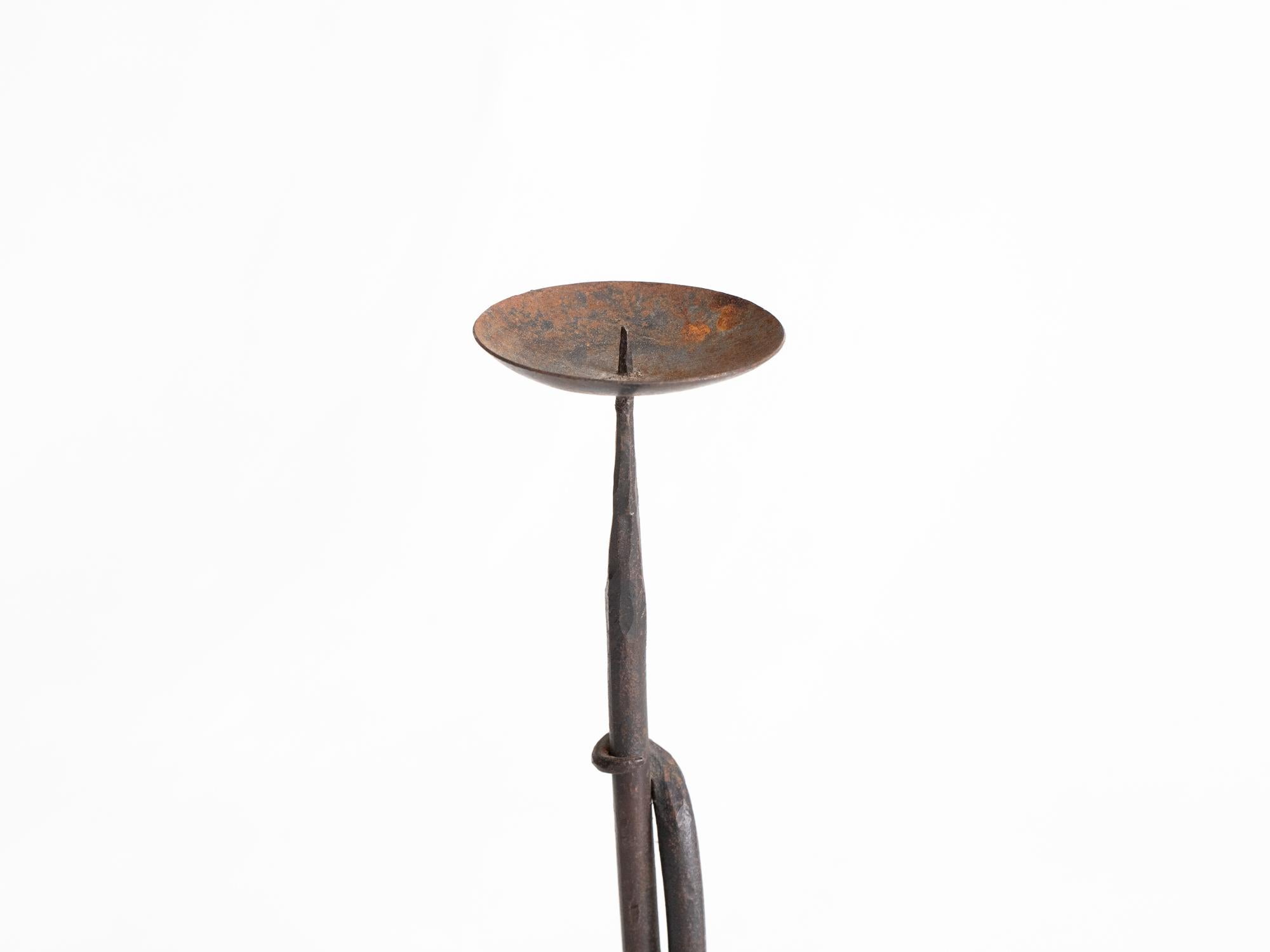 A pair of handcrafted forged iron candlesticks in the manner of Jean Touret and the artisans of Marolles and Loir-et-Cher. French, c. 1960.

54 x 20 x 18 cm

21.3 x 7.9 x 7.1 