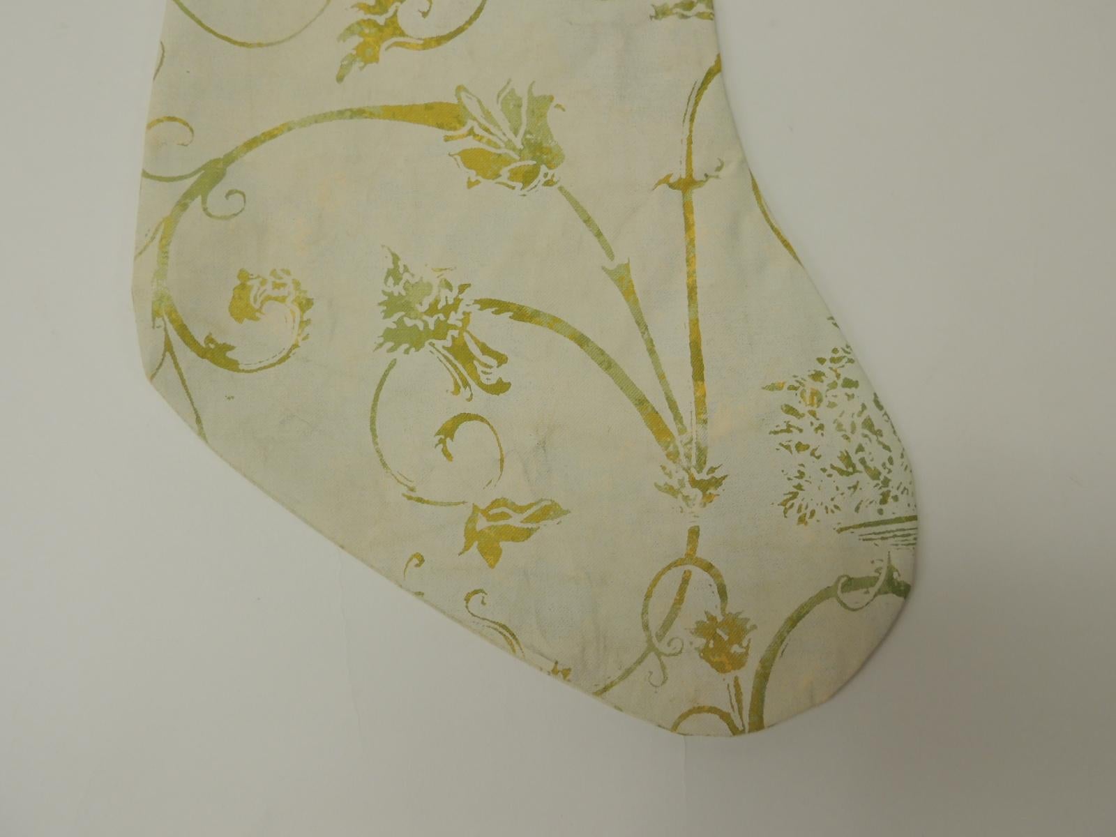 Artisanal holiday gift stocking.
Vintage Fortuny style screen printed in the USA, depicting birds of paradise and vines.
Doubled-sided, embellished with cotton green ribbon same as hanging hook.
Interlined with cotton fabric.
Limited edition of
