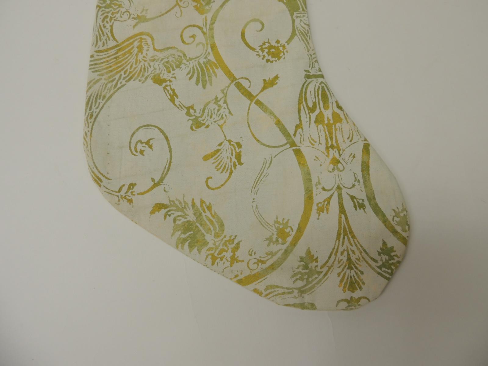 Artisanal holiday gift stocking.
Vintage Fortuny style screen printed in the USA, depicting birds of paradise and vines.
Doubled-sided, embellished with cotton green ribbon same as hanging hook.
Interlined with cotton fabric.
Limited edition of