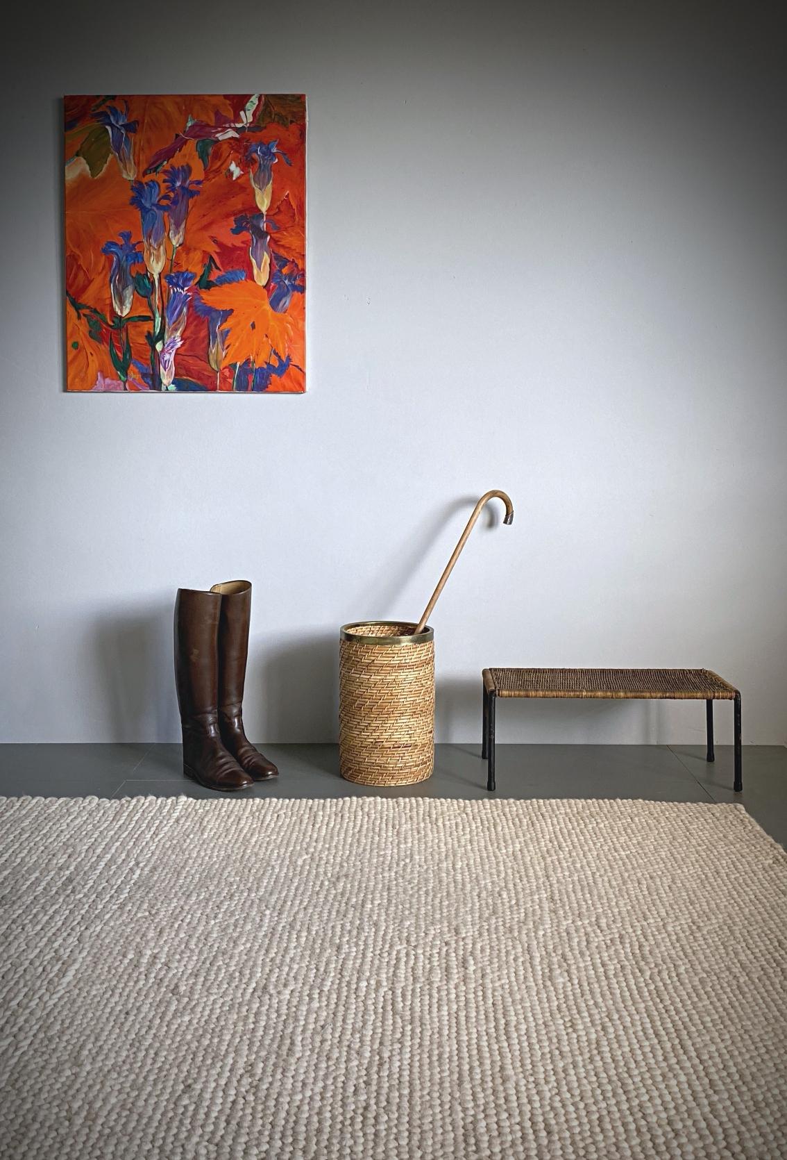 Beautiful modern umbrella stand or waste basket, handmade of wicker rattan with brass edge ring. Very fine French handwork in very good condition.


  