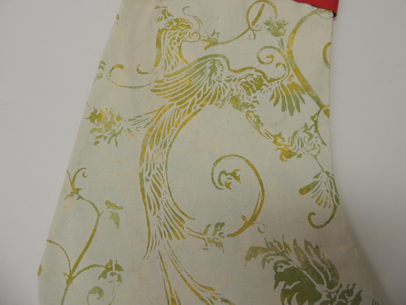 Artisanal holiday gift stocking.
Vintage Fortuny style screen printed in the USA, depicting birds of paradise and vines.
Doubled-sided, embellished with cotton red ribbon same as hanging hook.
Interlined with cotton fabric. Custom made and