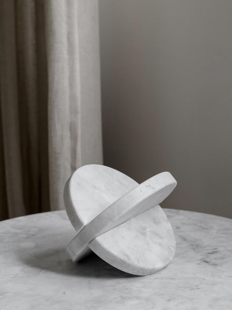 White marble home decor.

These bookends are made from hand cut white marble from Mexico. Each piece is carved from a solid block of marble and has a unique veining pattern that makes each bookend a unique work of art. We are excited to carry this