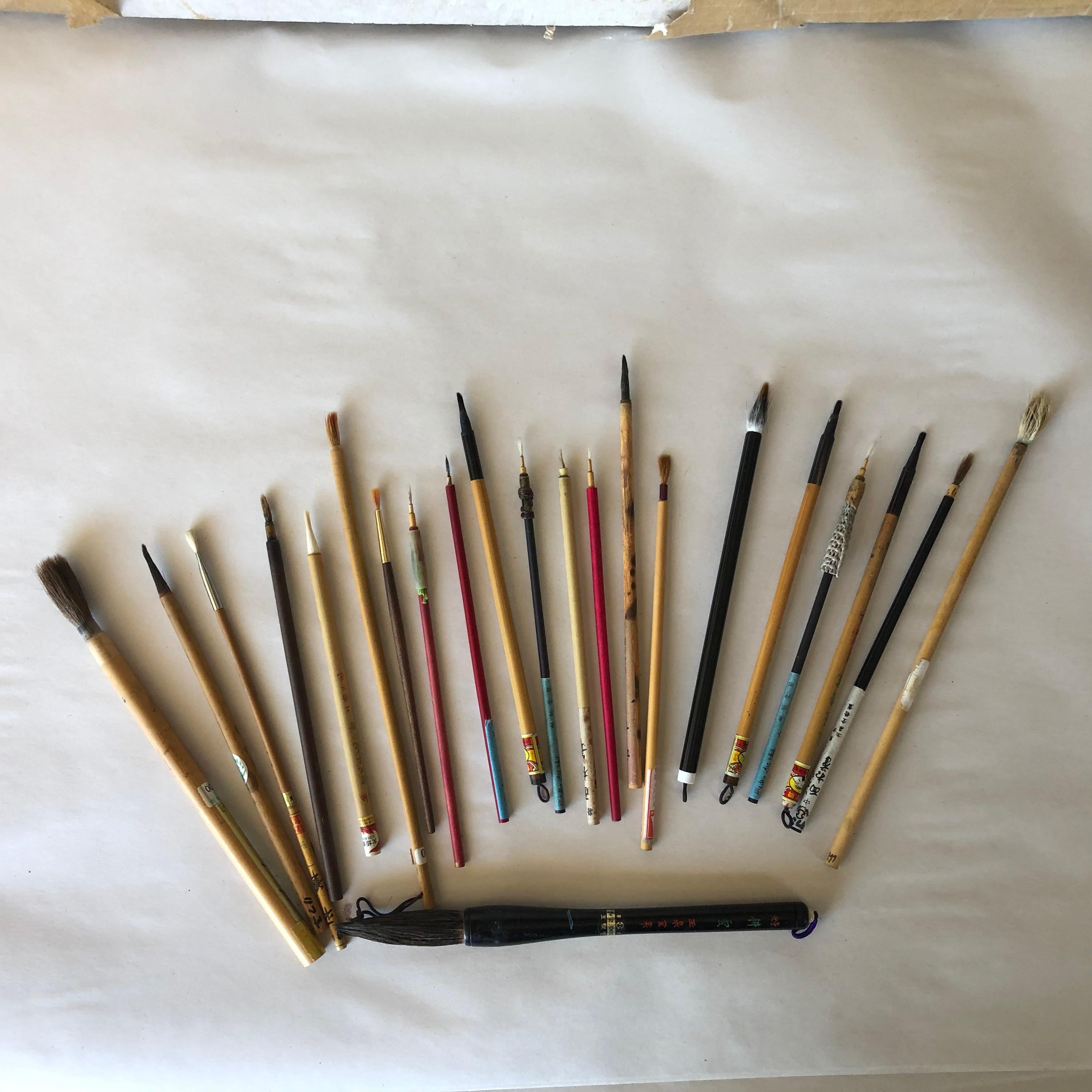 Here's a rare find from a collector we visited in Japan. A very unusual treasure from Japan, #2 

This is a cache of old Chinese and Japanese bamboo paint and calligraphy artist brushes dating back to the 1930s. The bundle includes new and used
