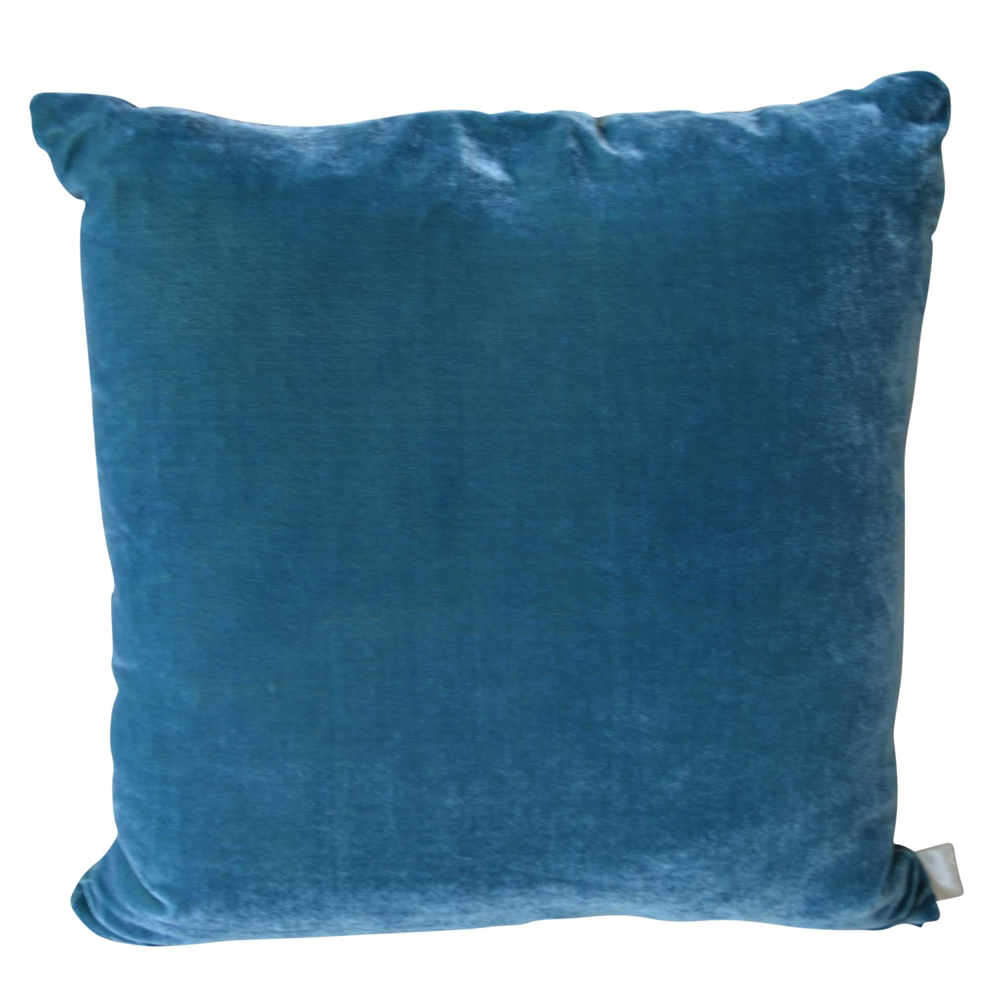 Artisan hand-dyed velvet pillow has a teal front design with a coordinating blue green back. The new take on the classic grape design was inspired by the artist's walking amongst the vines in the Bordeaux region on holiday. The inserts are filled