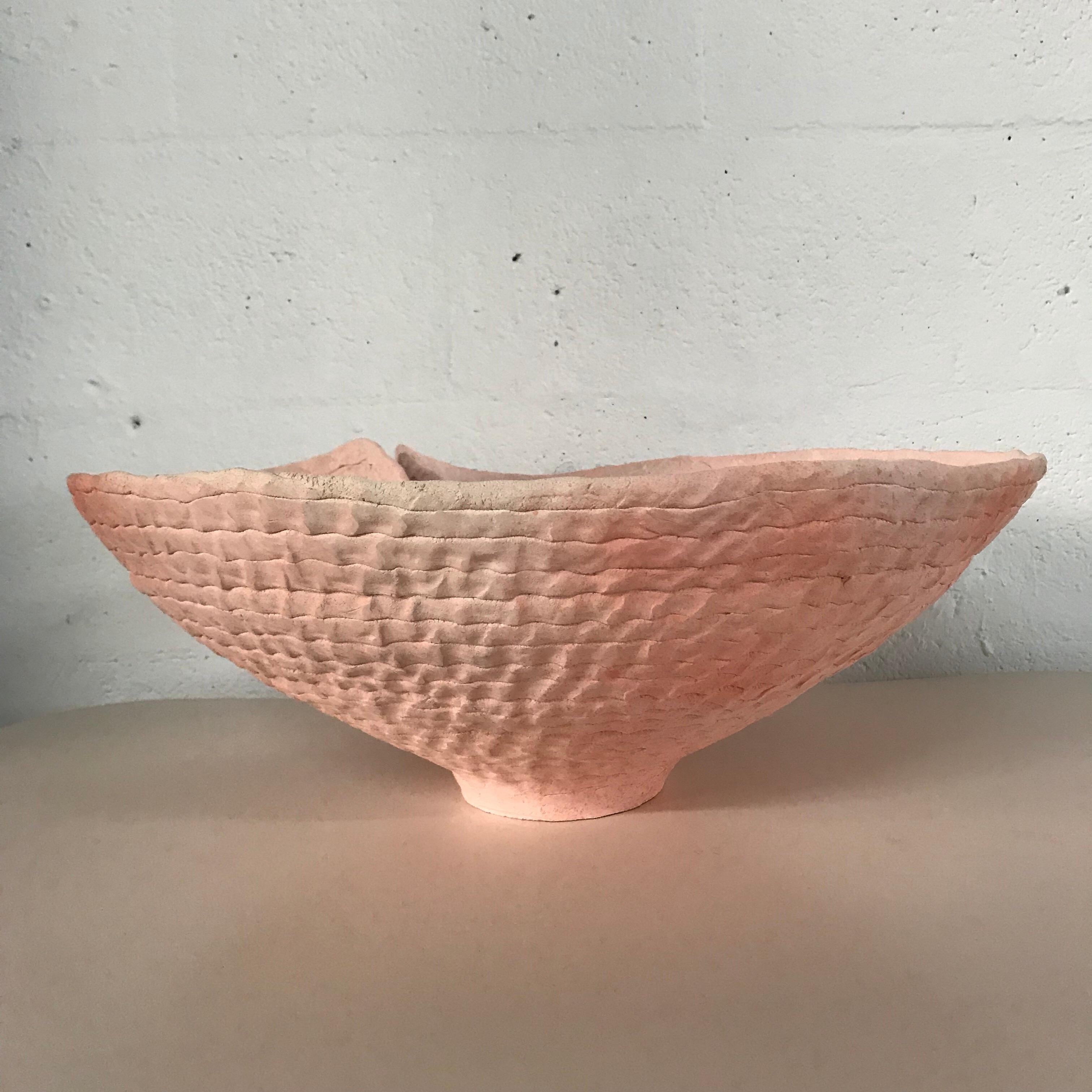 Artist made coil and pinch ceramic bowl, signed Terry, circa 1980s

pink with blue splatter glaze.