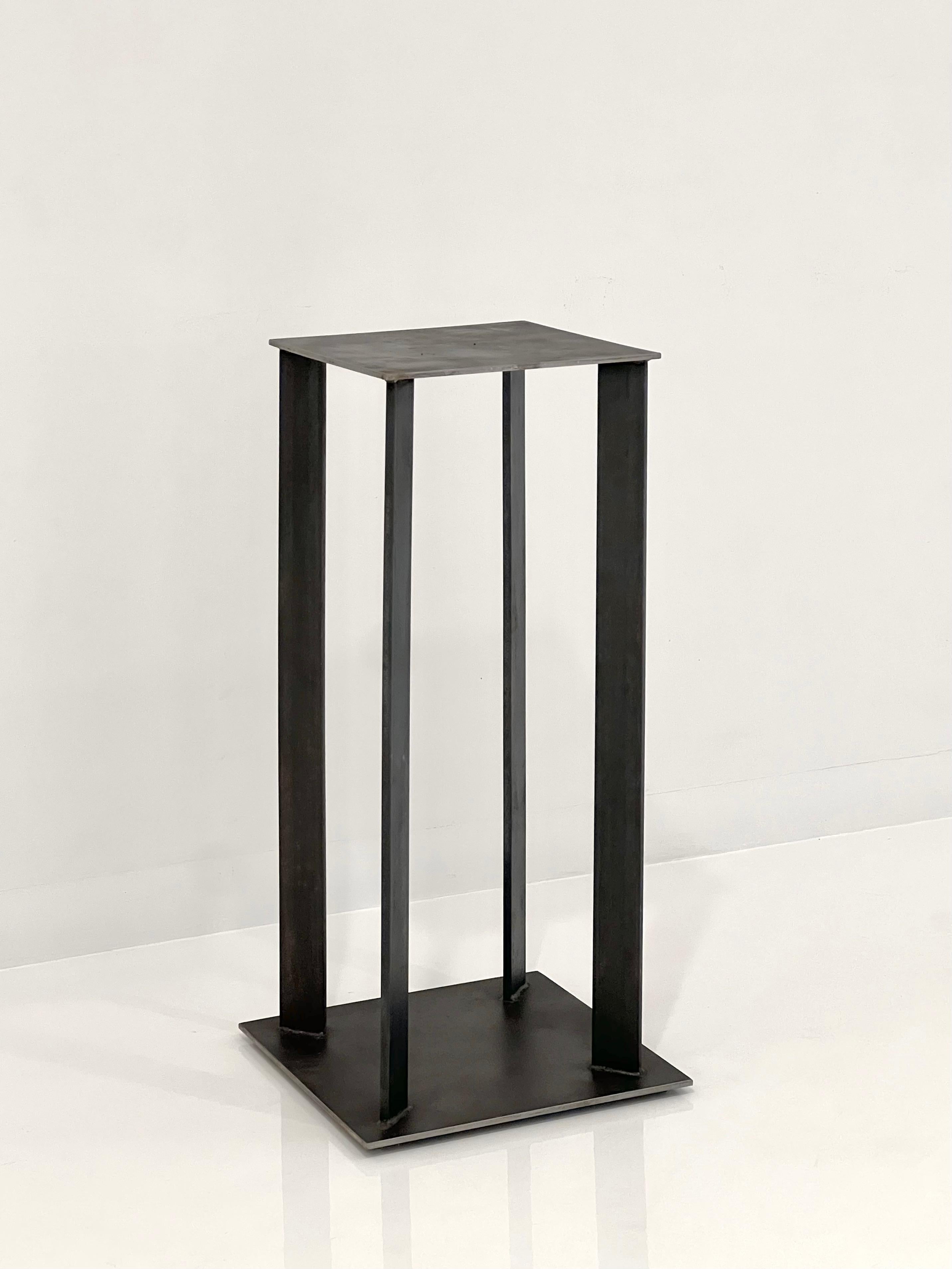 A simple design perfect for displaying art objects by local New York area contemporary sculptor Robert Koch.