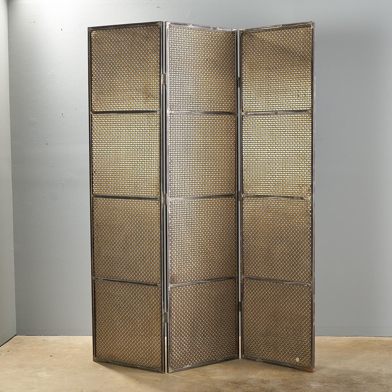 Expertly hand crafted folding screen by noted Virginia artist & Sculptor Maurice Beane. Very heavy gauge woven steel. This screen adds so much texture and dimension to a space, and can easily go in a very glam moody direction, to industrial, to a