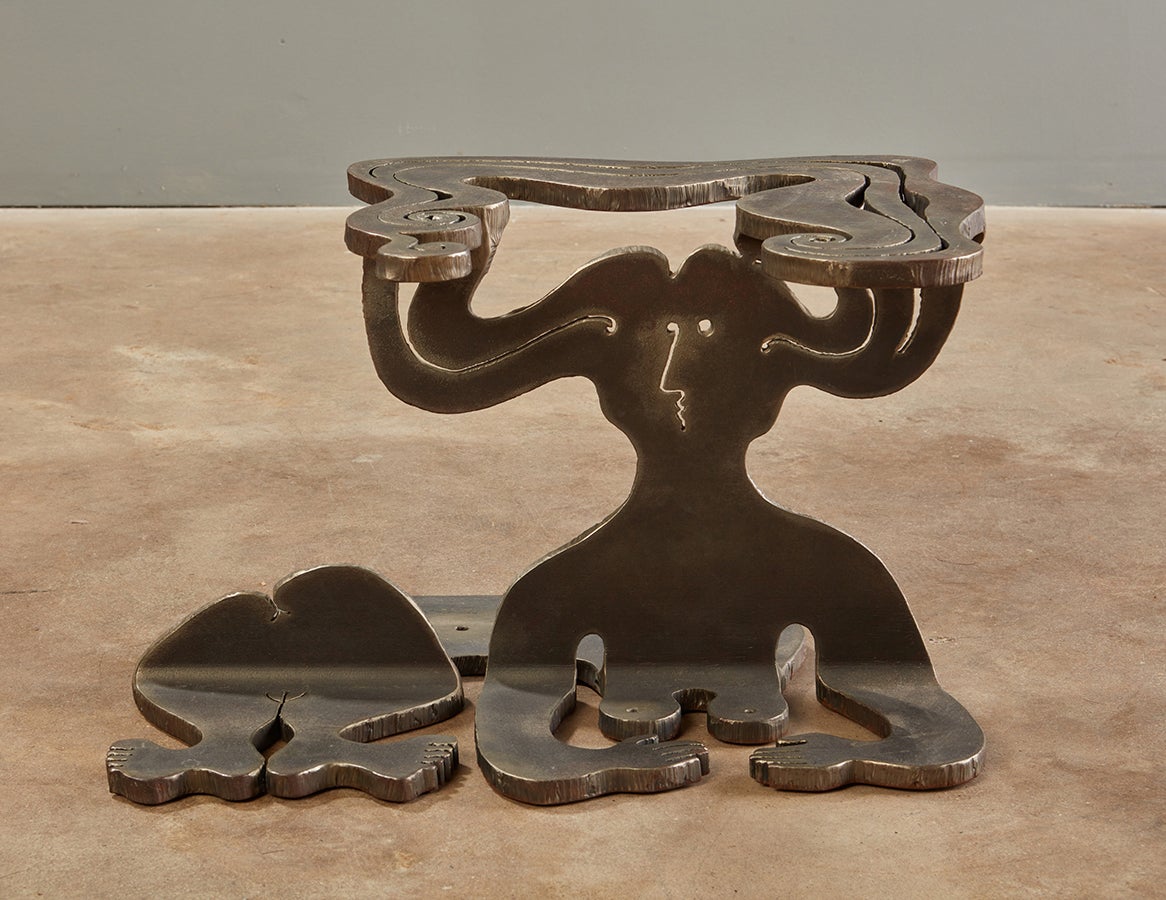 Artist made sculptural figural torch cut steel coffee or side table by Albert Leon Wilson (1920-1999)

One of a kind table by sculptor and artist A.L. Wilson, of Rochester NY.
A light-hearted approach to an industrial method of art making,