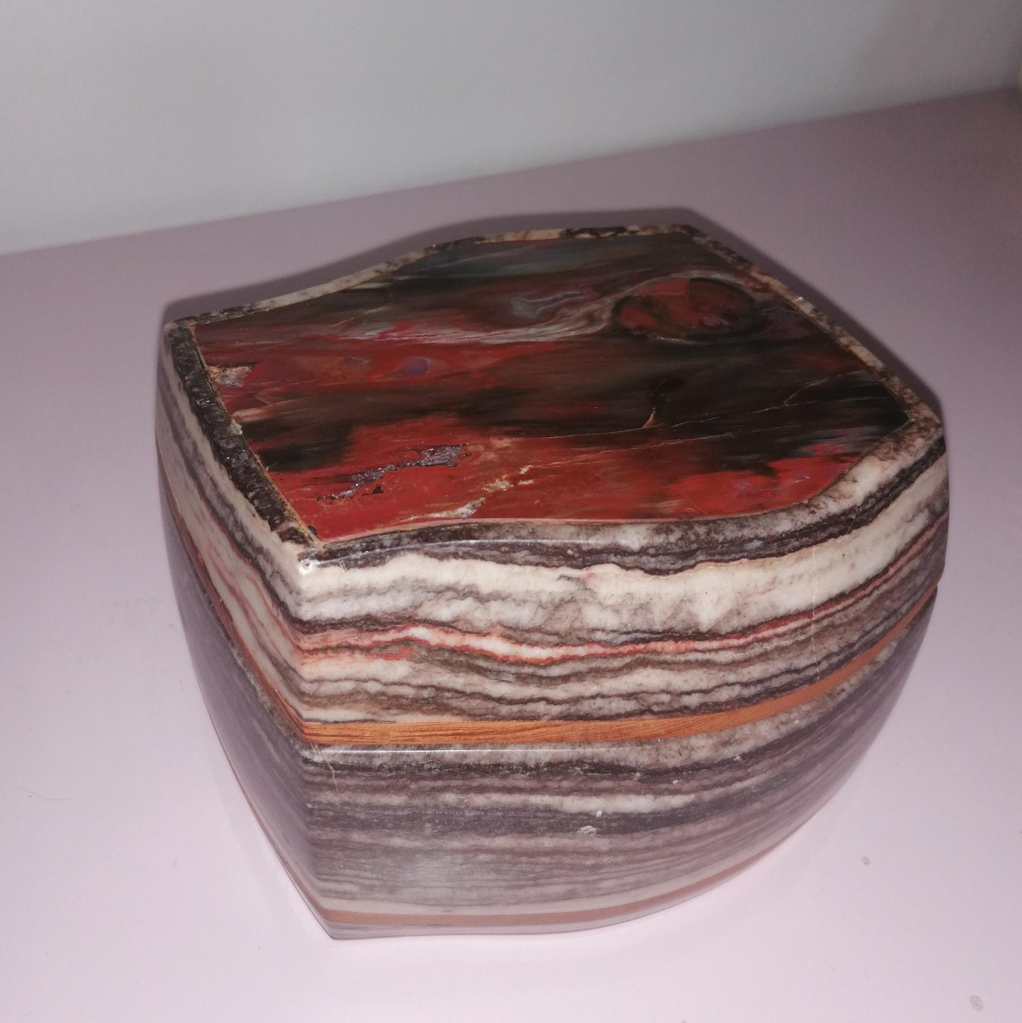 This beautifully tactile sculptural onyx lidded box is a unique artist-made piece...unfortunately I've been unable to identify the maker's mark. We sourced it in Phoenix, Arizona, along with another lidded vessel, and a vase, by the same maker ( see