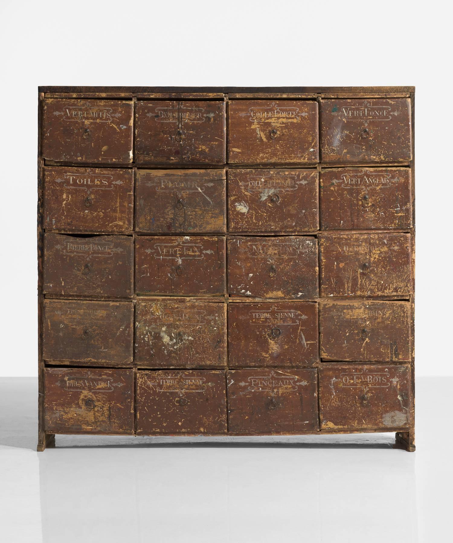 Artist pigment drawers, France, circa 1820.

Heavily patinated pine chest of drawers originally used for paint pigments includes drawers with hand-lettered labels.