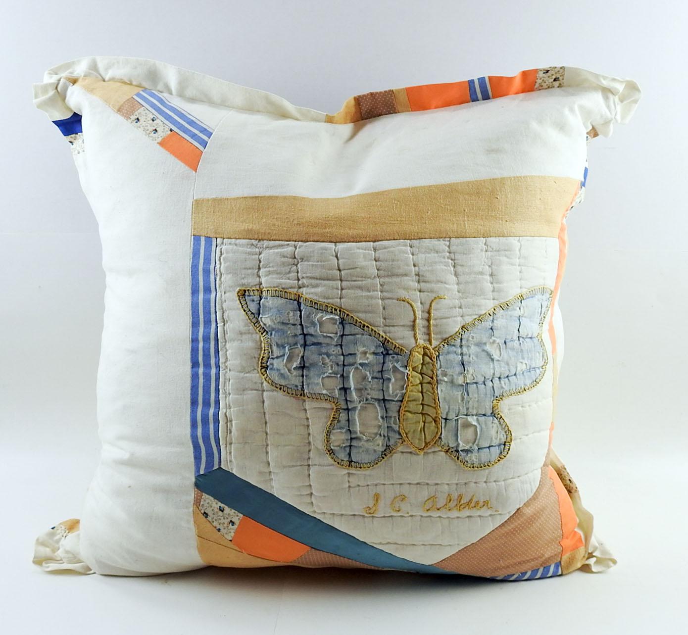 One of a kind artist made pillow from vintage textiles by Linda Thompson. Antique quilt square with butterfly, vintage cotton and linen, silk cord and mother of pearl closure. Amazing attention to detail, colored strips are pieced and inset to