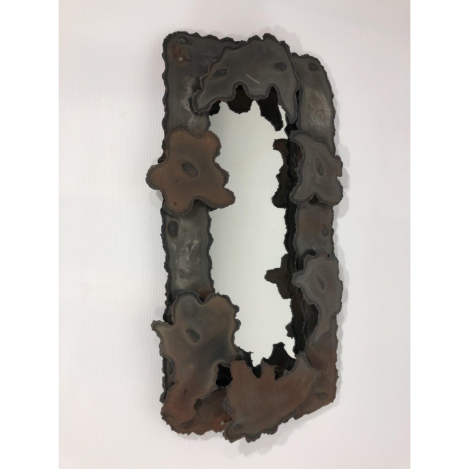 Torched steel Brutalist wall mirror, Israel 1970s.