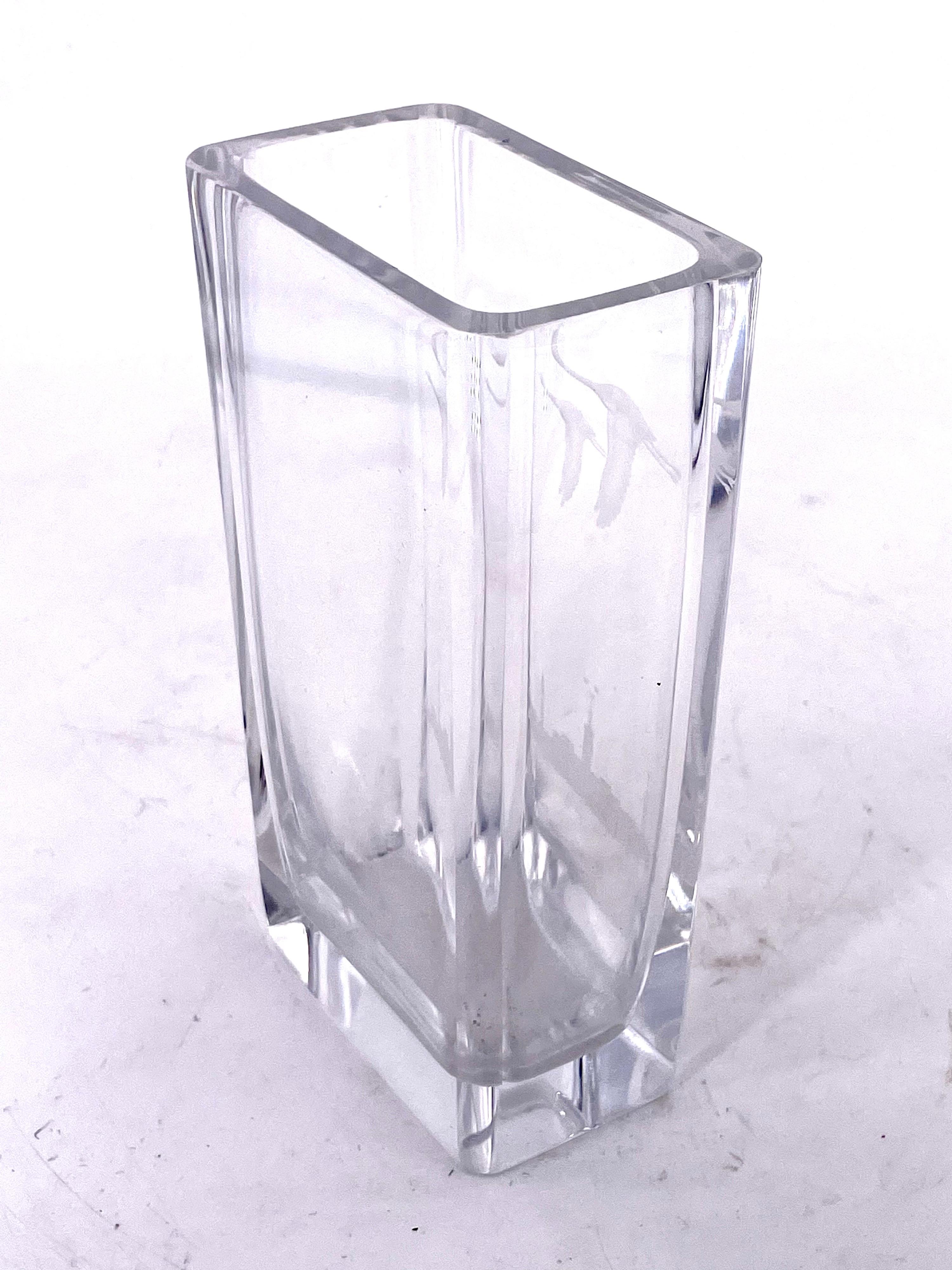 A beautiful signed Orrefors crystal vase was made in Sweden during the 1970s in a Mid-Century Modern style. The vase is clearly signed 