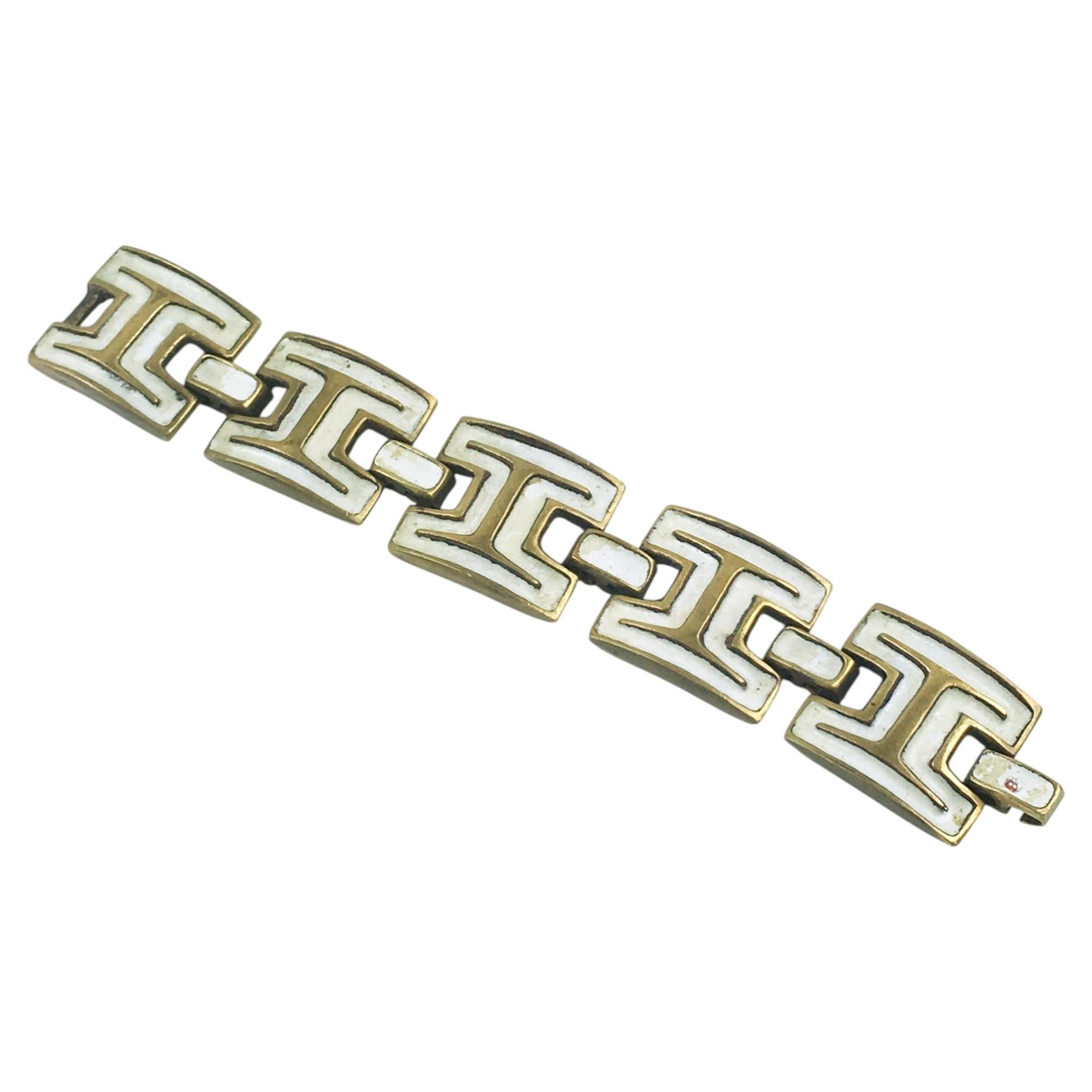 Künstler St. Luc Mitte des Jahrhunderts Vergoldete Bronze und weißes Emaille A Link-Armband im Angebot