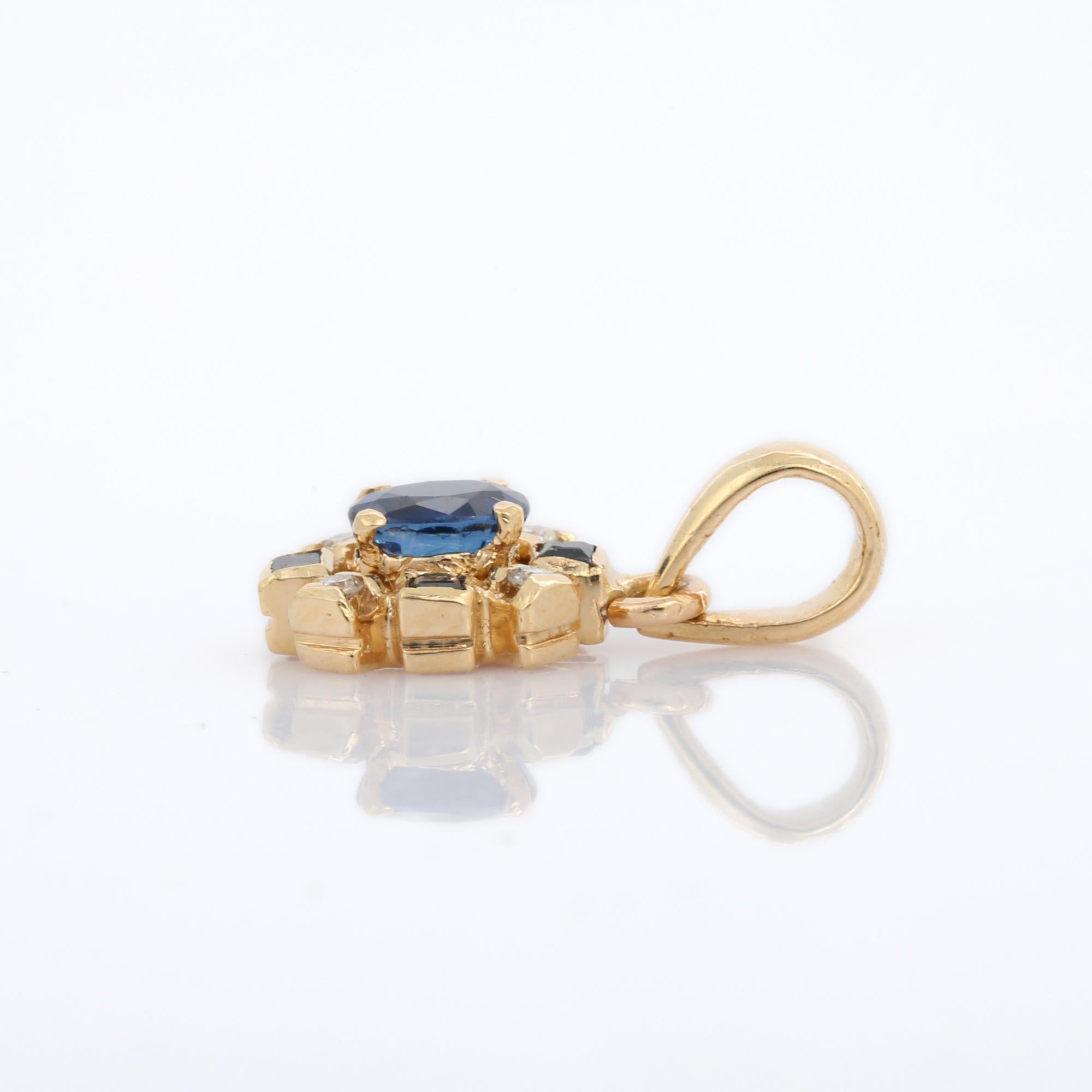 Oval Cut Artist Style Blue Sapphire Floral Pendant in 14K Yellow Gold with Diamonds For Sale