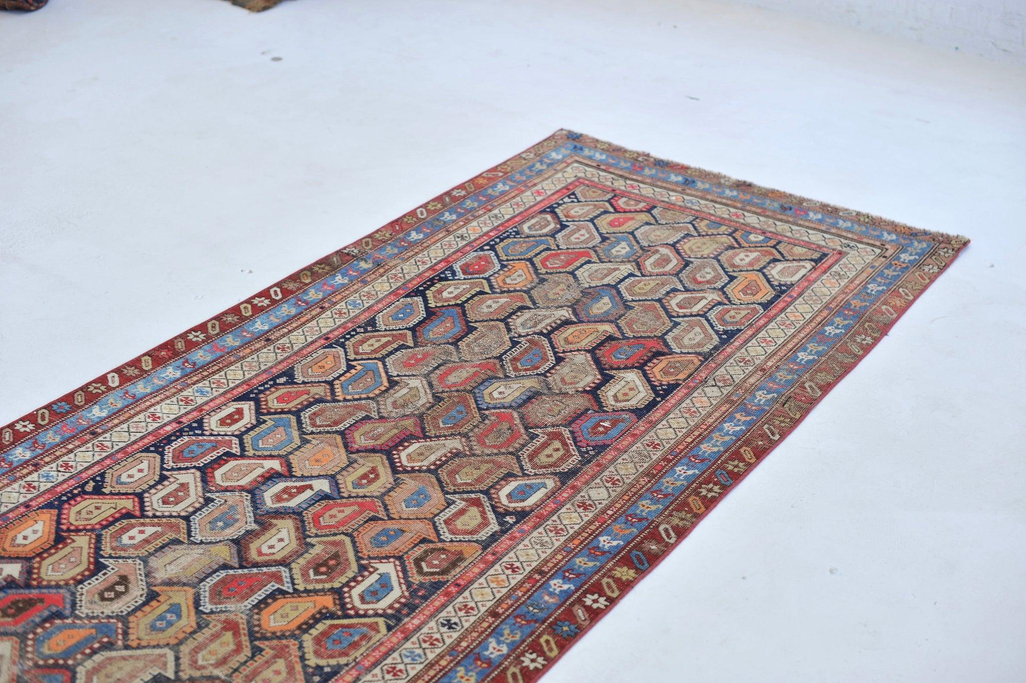 Gia Stylized All-Over Boteh Design Antique Rug

About: This is absolutely one of the more gorgeous antique runners we've ever seen. Stylized field of 