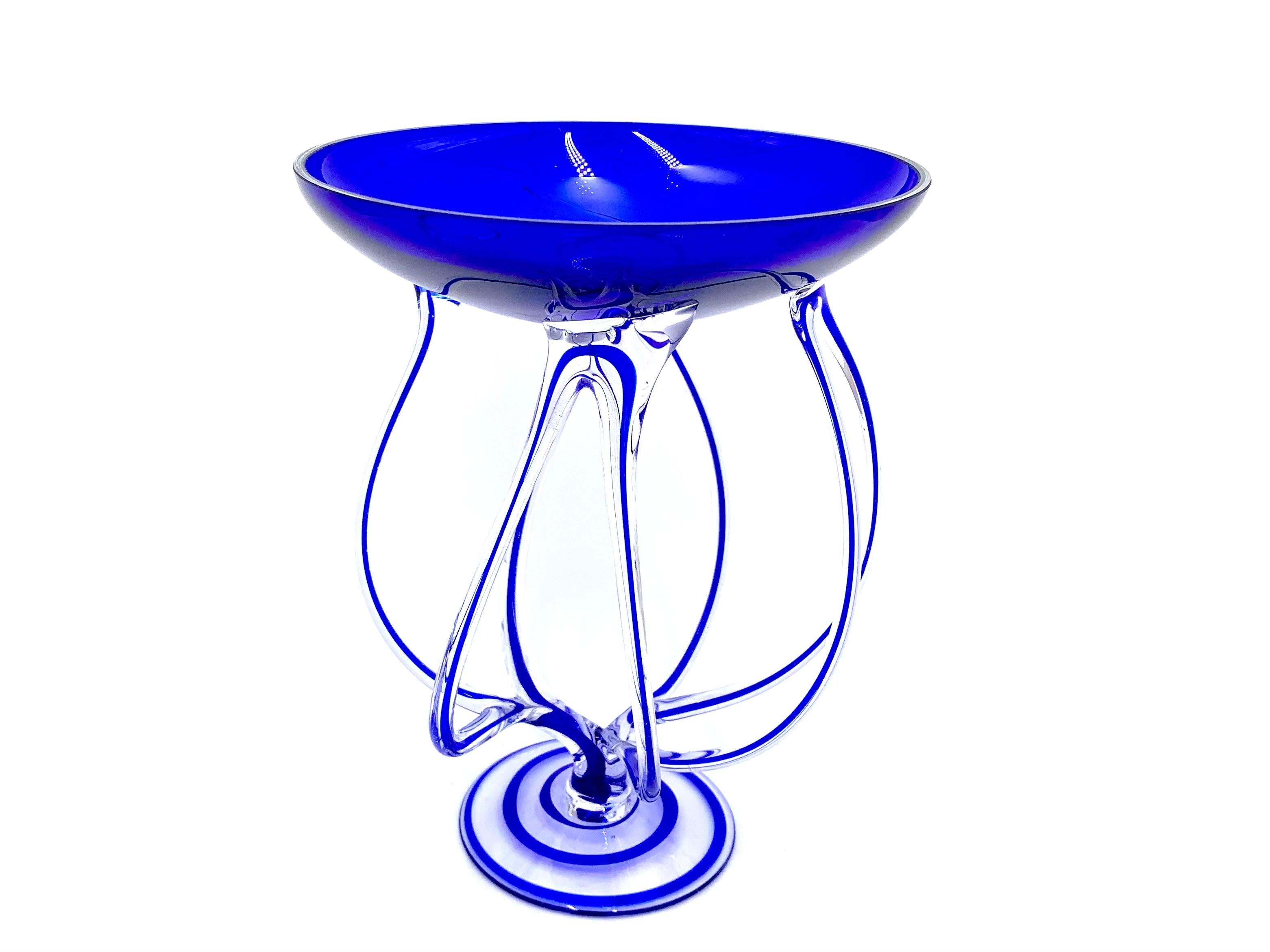 Decoration - a goblet made of art glass

Made in Poland in the 1970s

Very good condition

Measures: height 22.5 cm, diameter 18 cm.